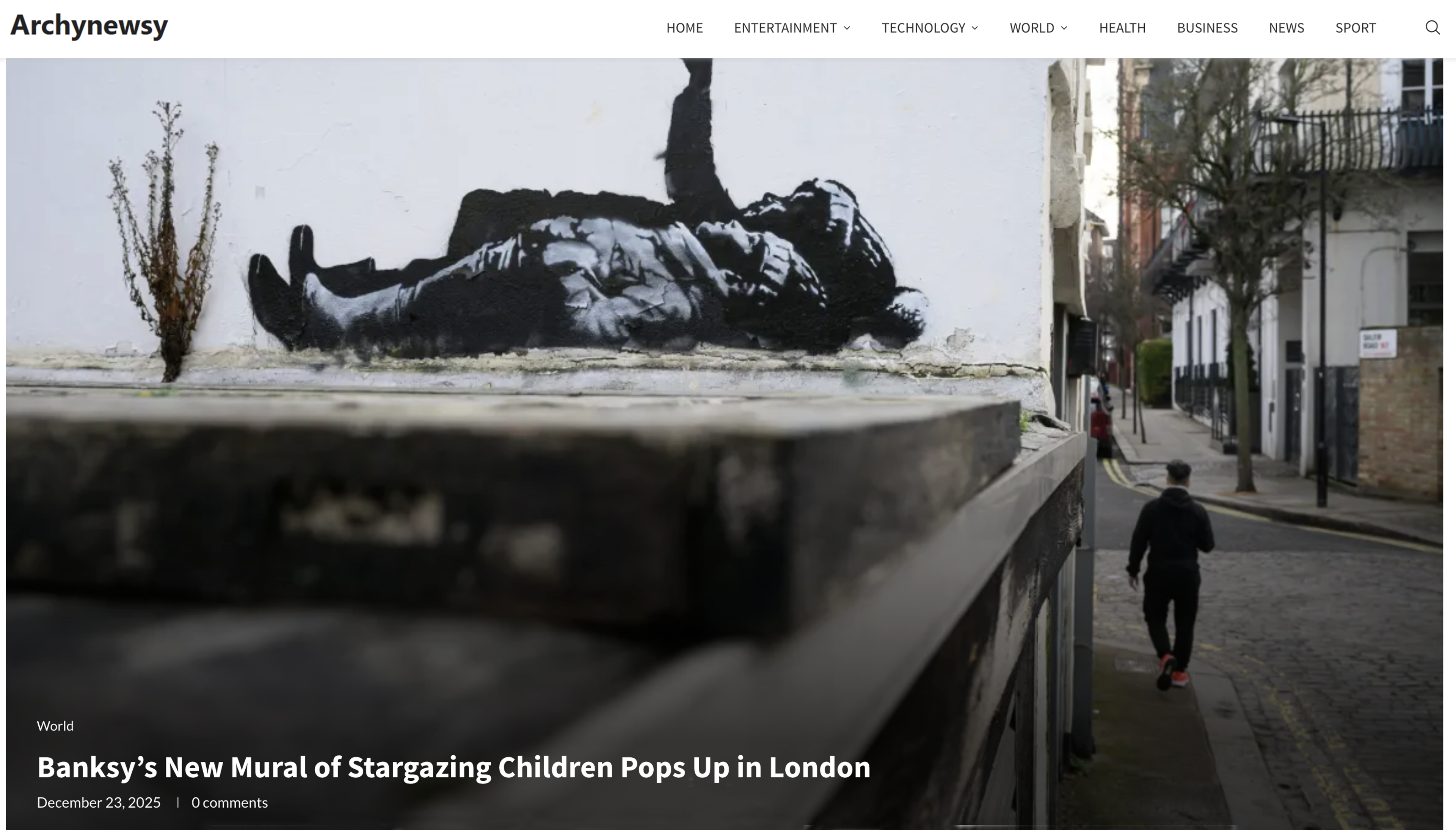 Archynewsy article depicting Banksy's mural of children lying down pointing up
