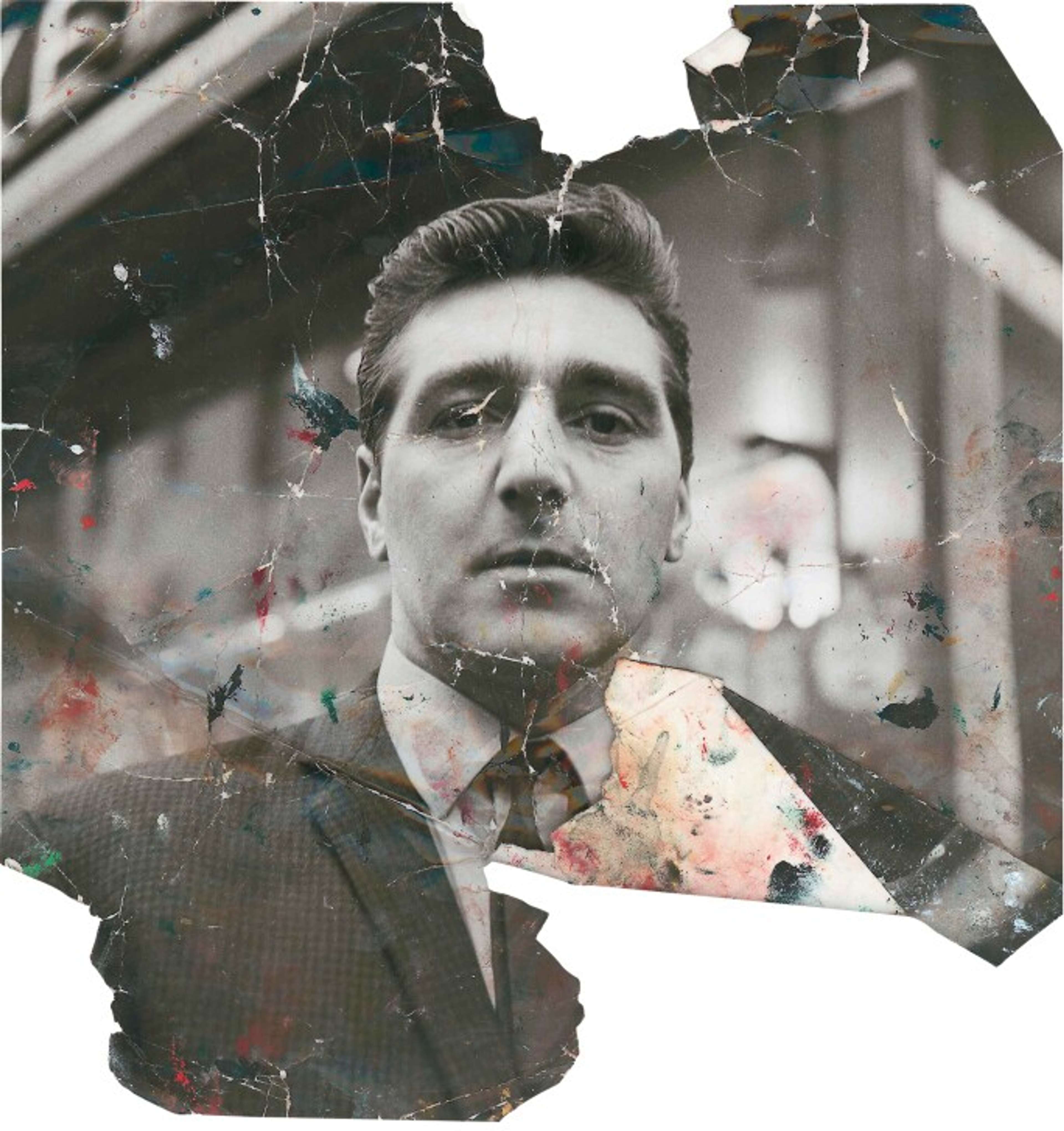 Photographie endommagée et éclaboussée de peinture d'un jeune homme séduisant