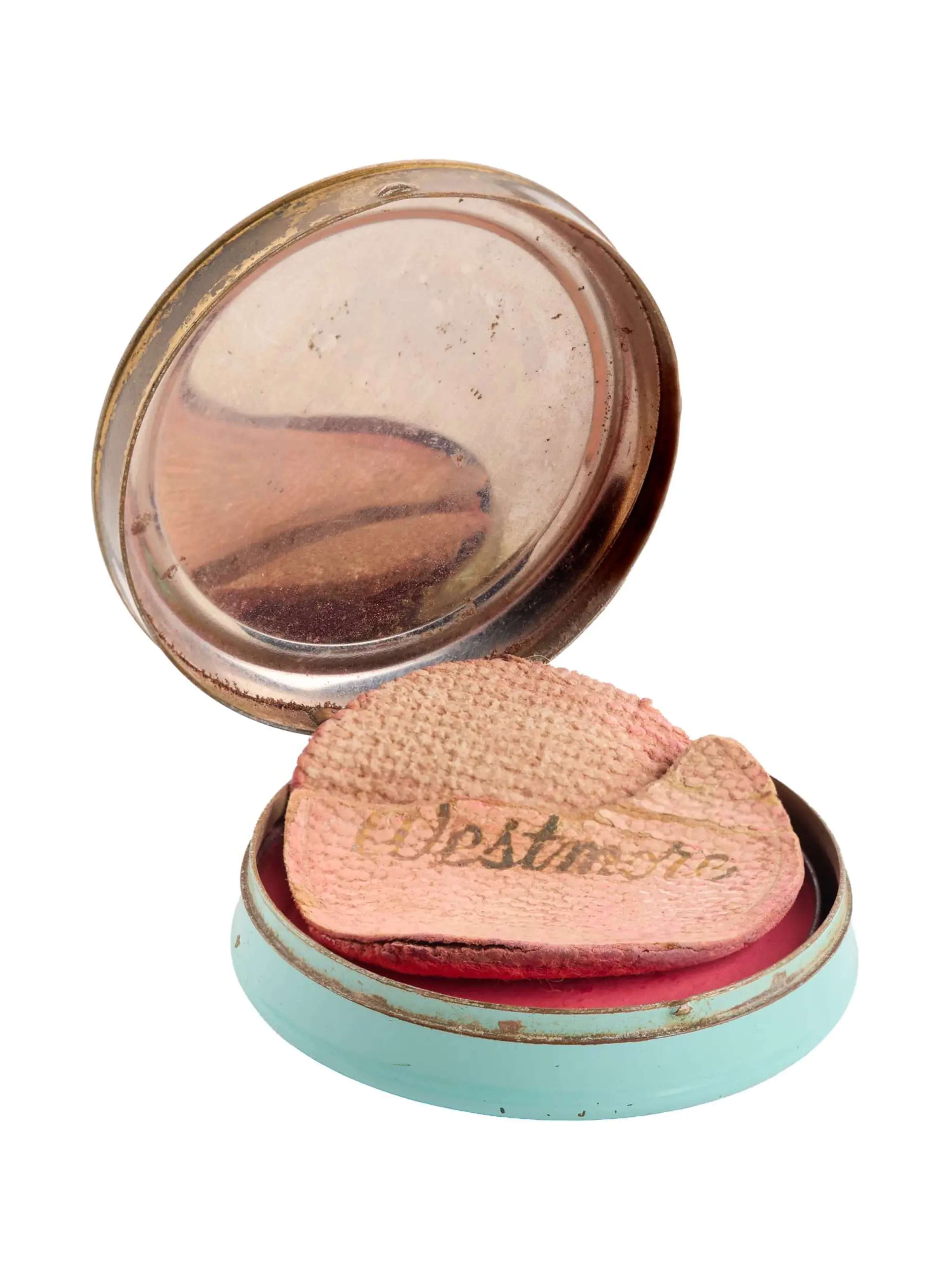 Vintage House of Westmore Rouge compact associated with Marilyn Monroe, featuring original branding and 1950s cosmetic design.