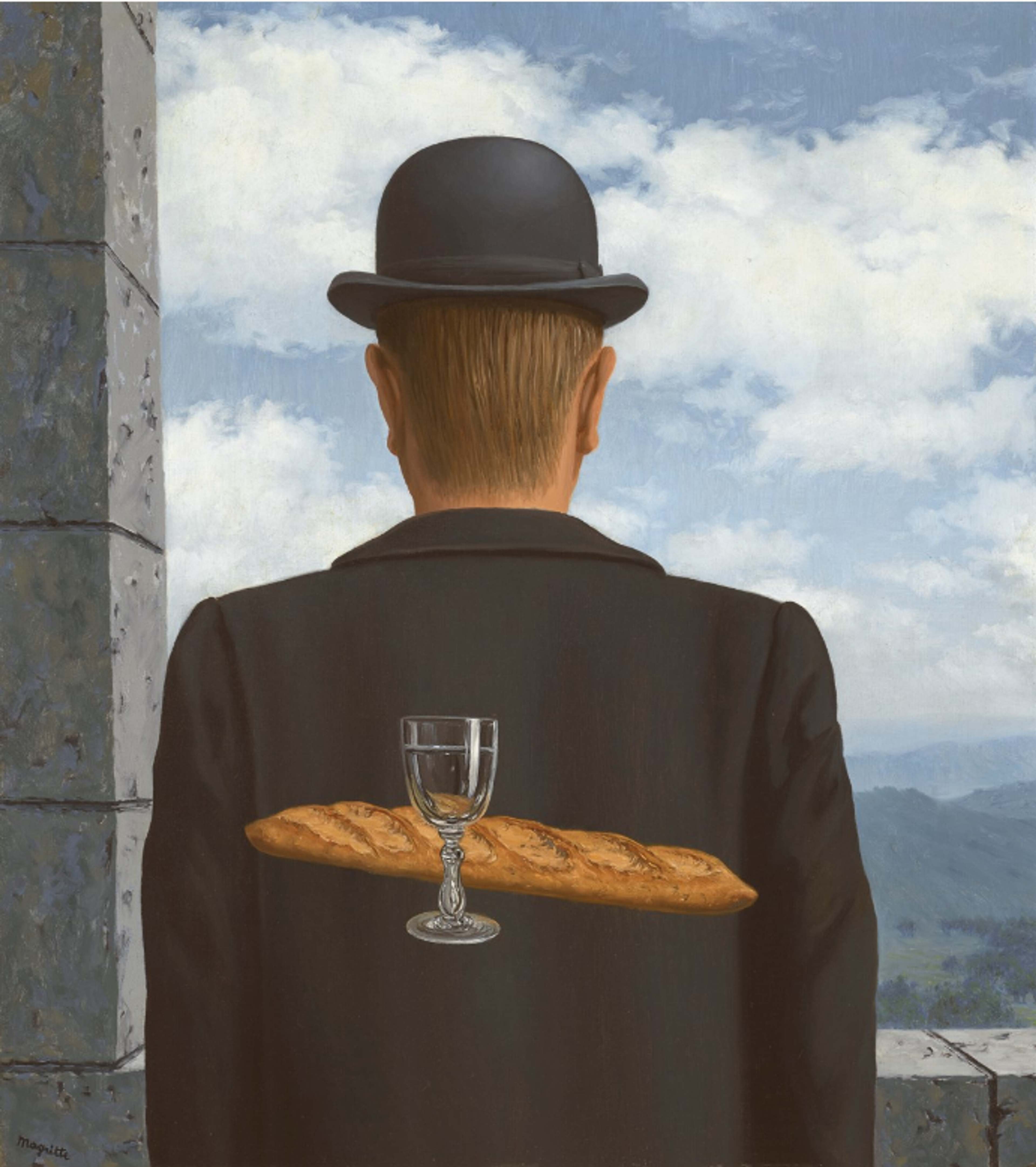 The back view of a man in a dark suit and bowler hat, looking out of a stone window frame across a vast rural landscape. A glass of white wine and a baguette hover behind him.