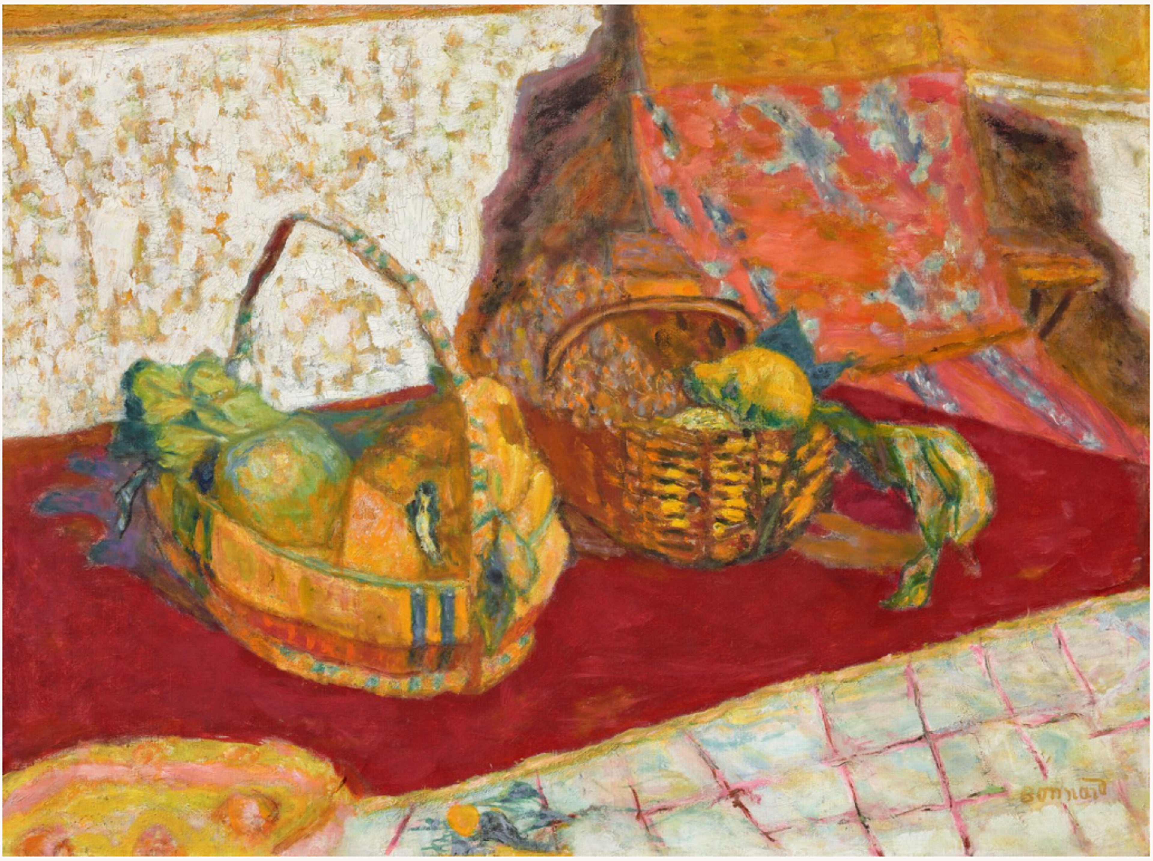 Two fruit baskets on a bright red tablecloth against a light background. Various fruits in greens and yellows are visible in the baskets, with subtle shadows cast across the textured surface.