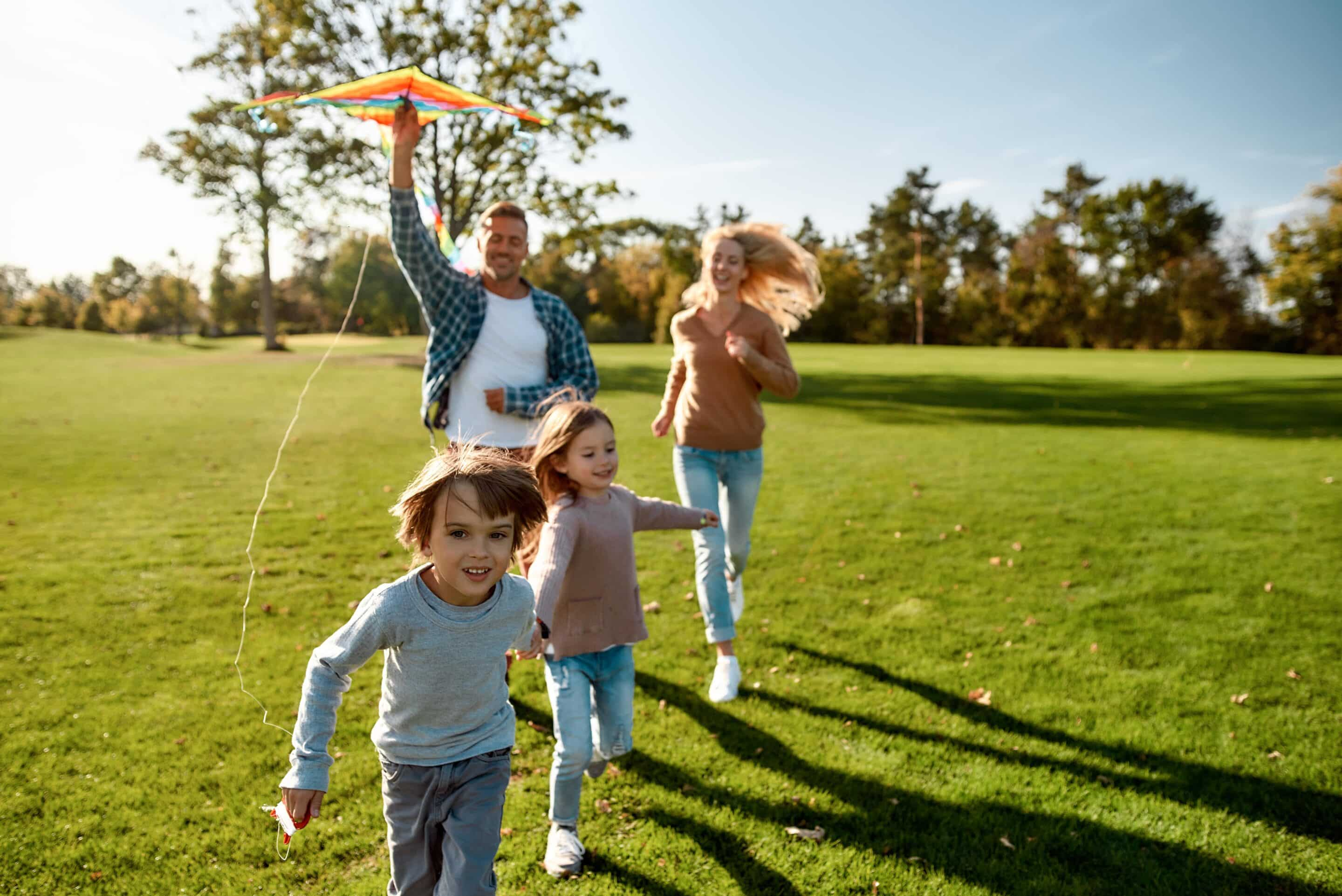 Healthy toddler playing outdoors, representing natural immunity and resilience supported through homeopathic care.
