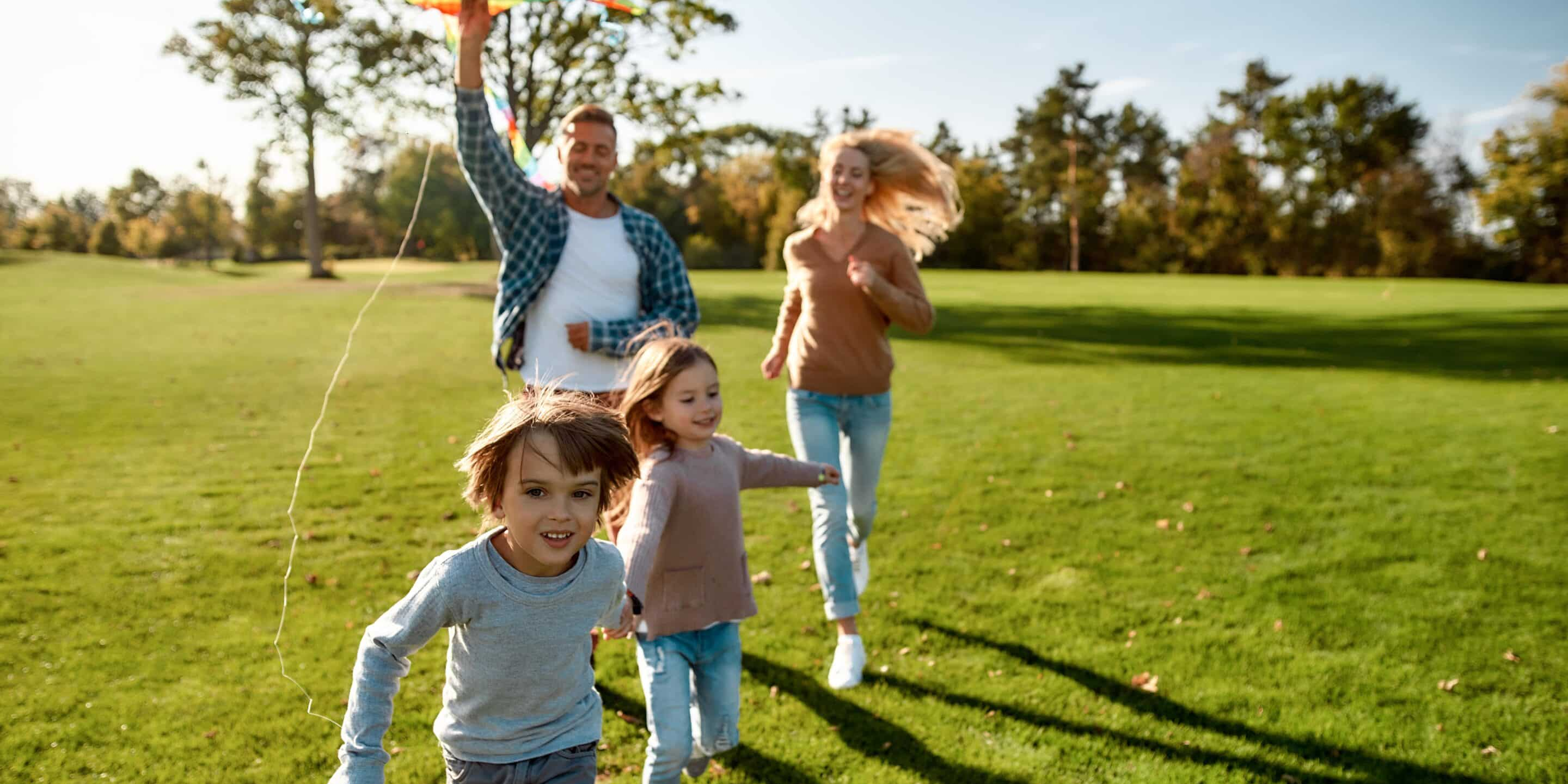 Healthy toddler playing outdoors, representing natural immunity and resilience supported through homeopathic care.