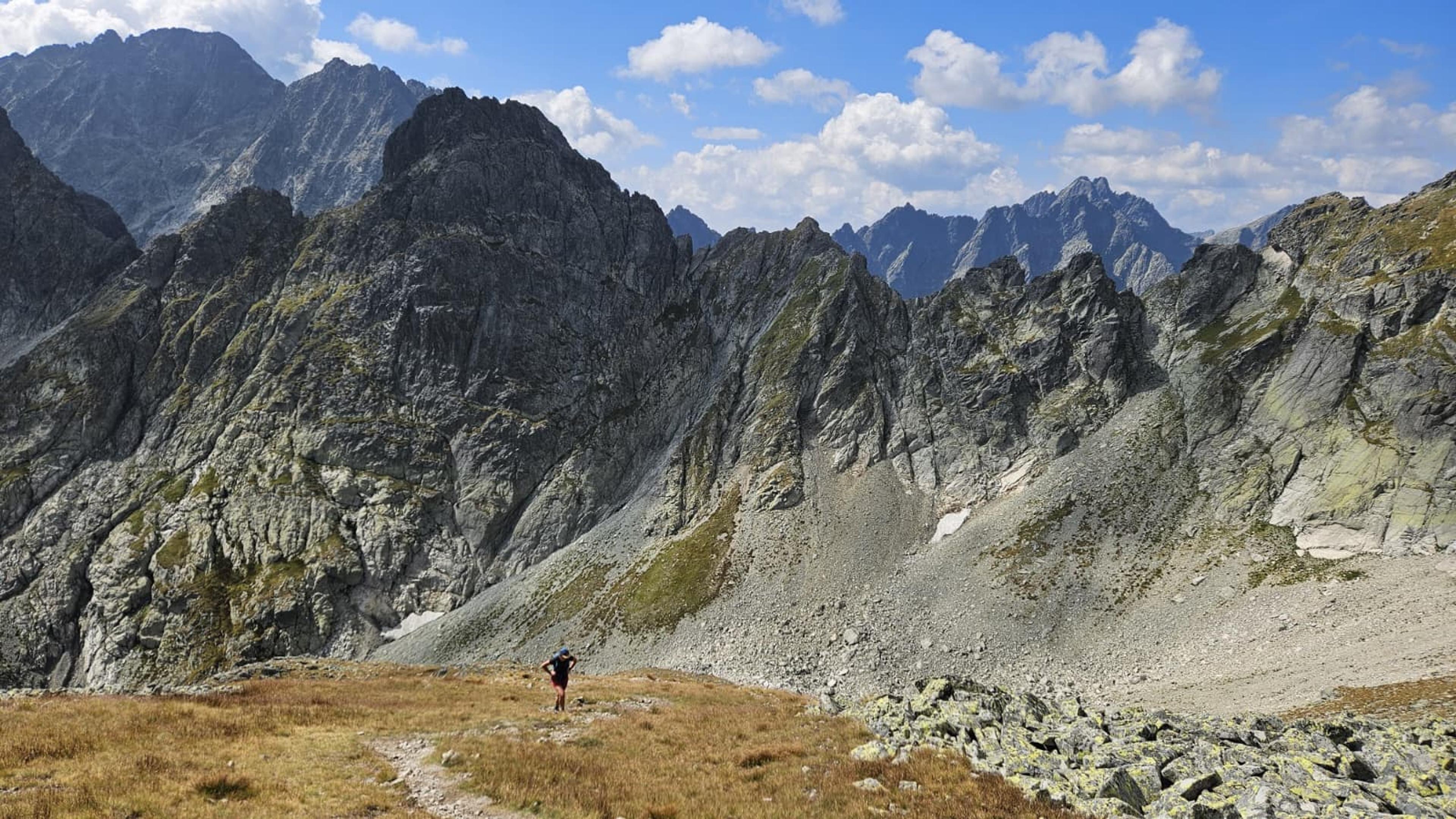 small person wakling up to the peaks