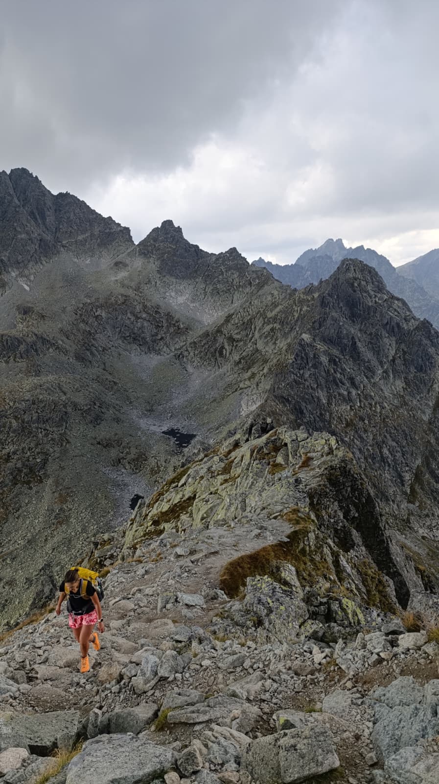 girl hiking in the vig steep mountain in high tatras