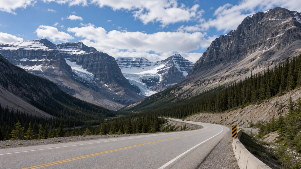 Icefields Parkway road curving through the Canadian Rockies