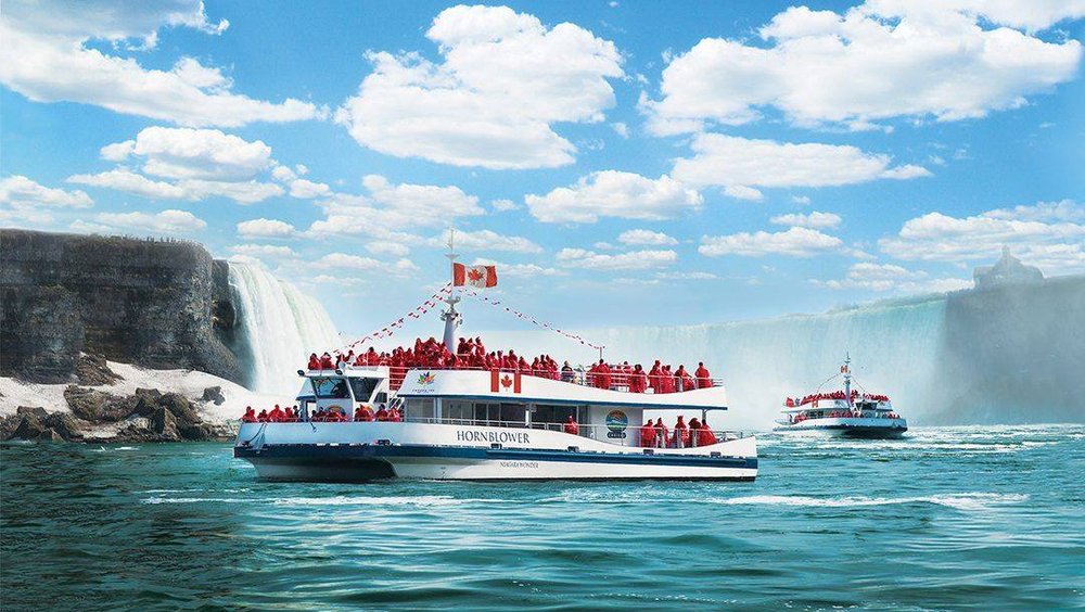 Hornblower boat entering the mist at Niagara Falls in Ontario