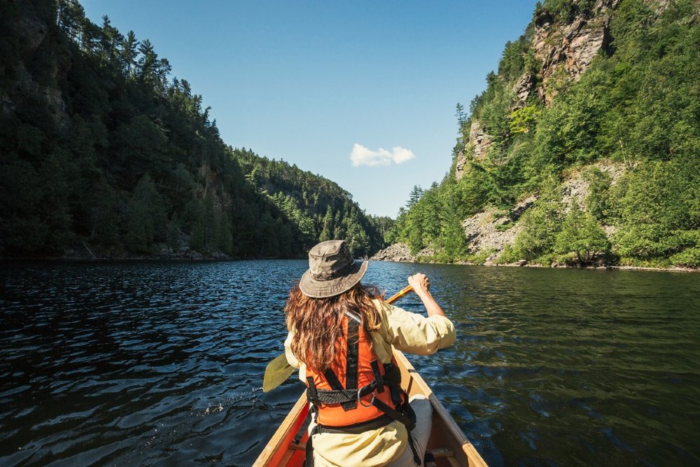 Canoe on a quiet lake in Algonquin Provincial Park Ontario