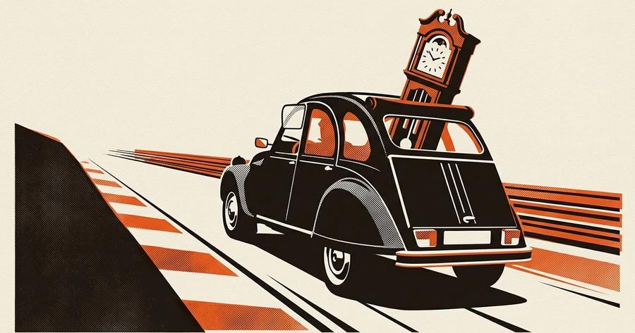 1983 Citroën 2CV with a grandfather clock loaded inside, at Lime Rock Park.