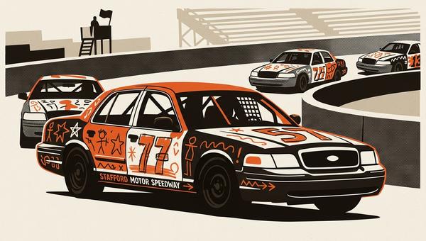 A post-2003 Ford Crown Victoria spec race car with roll cage, steel wheels, and spray-painted kindergarten-style decoration in yellow, on track at Sta