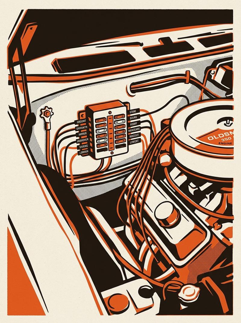 Close-up three-quarter view of a modern blade-style fuse block mounted inside the engine bay of the 1969 Oldsmobile Cutlass, with individual labeled c