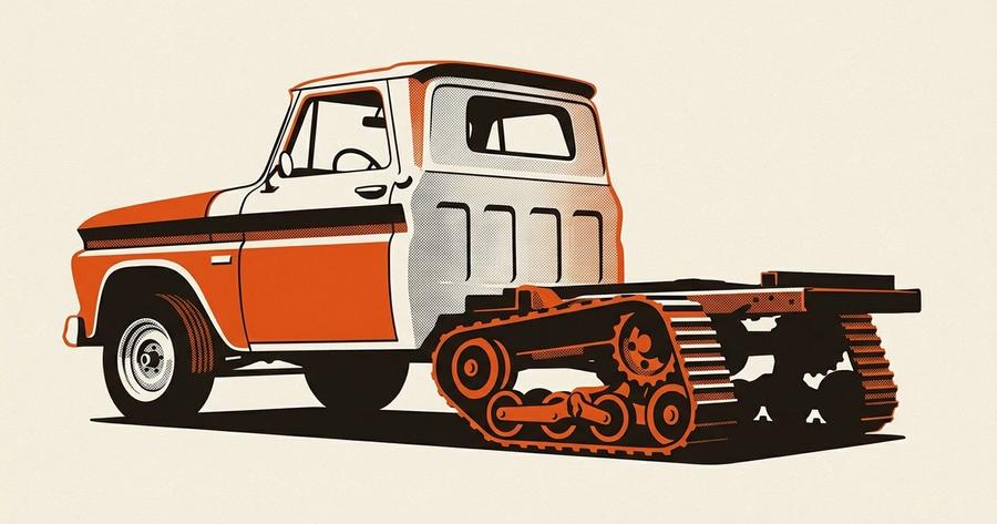 Barn-find vintage pickup half-track build, mid-restoration with rear track system installed and front wheels still fitted.