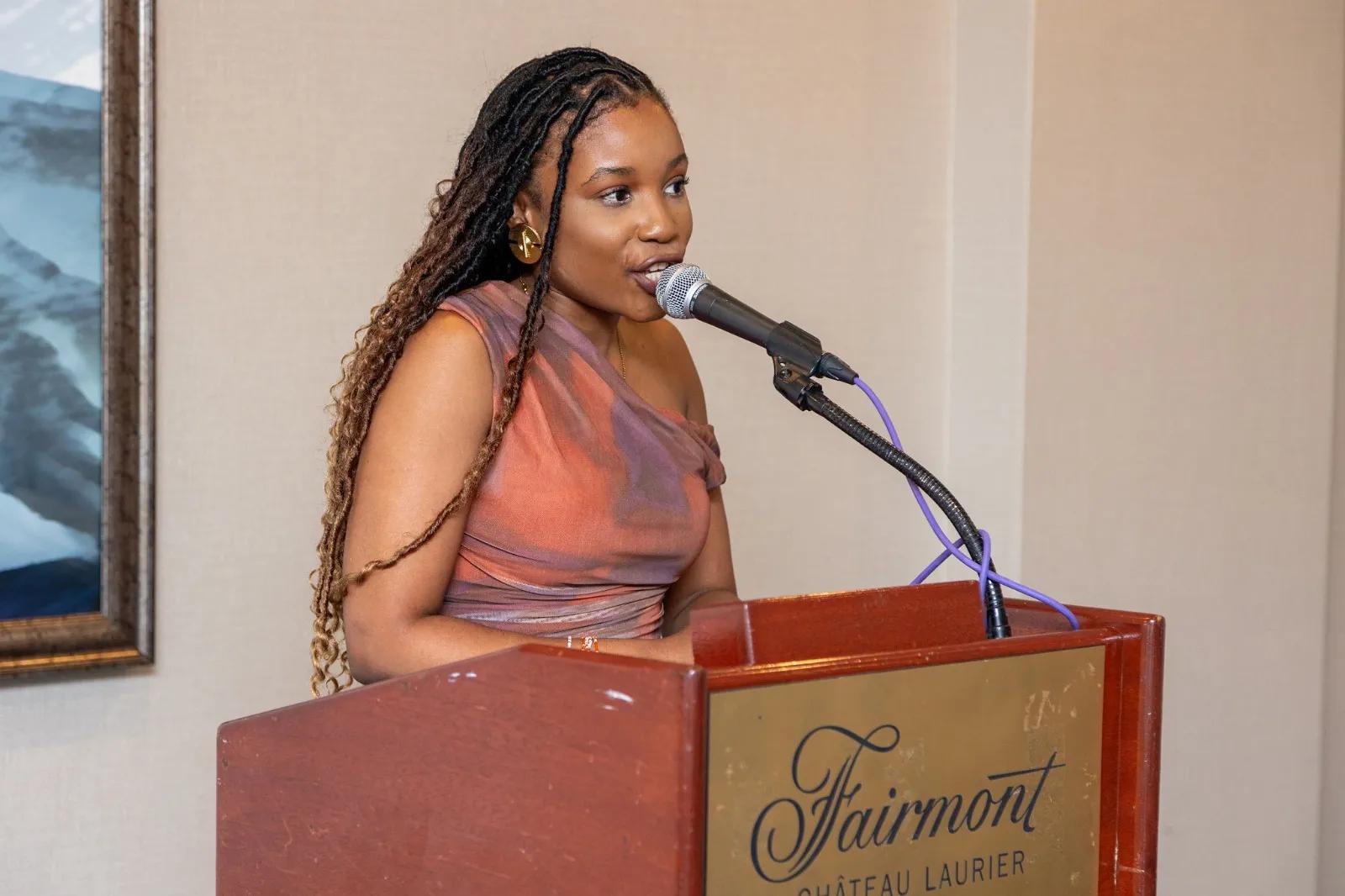Irenas & Allies speaker addressing an audience at the Fairmont Château Laurier