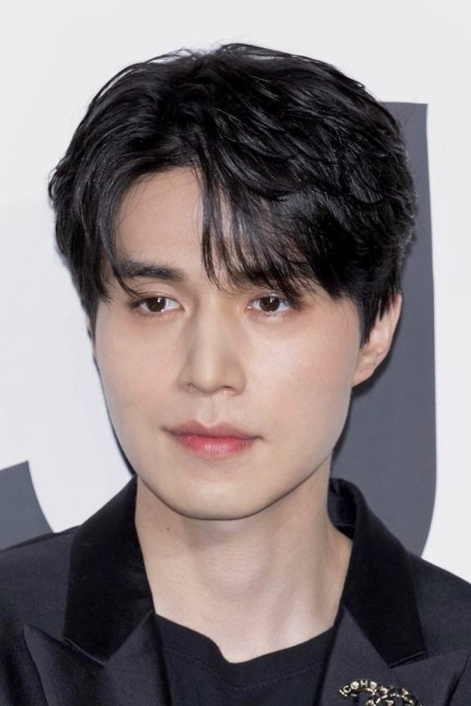 Foto profil Lee Dong-wook, pemeran Jeong Jin-man dalam A Shop for Killers