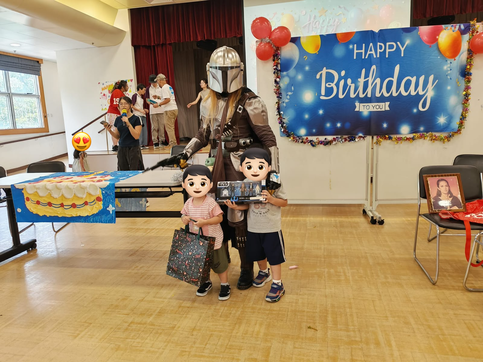 Two children hold gifts beside an armored party character.