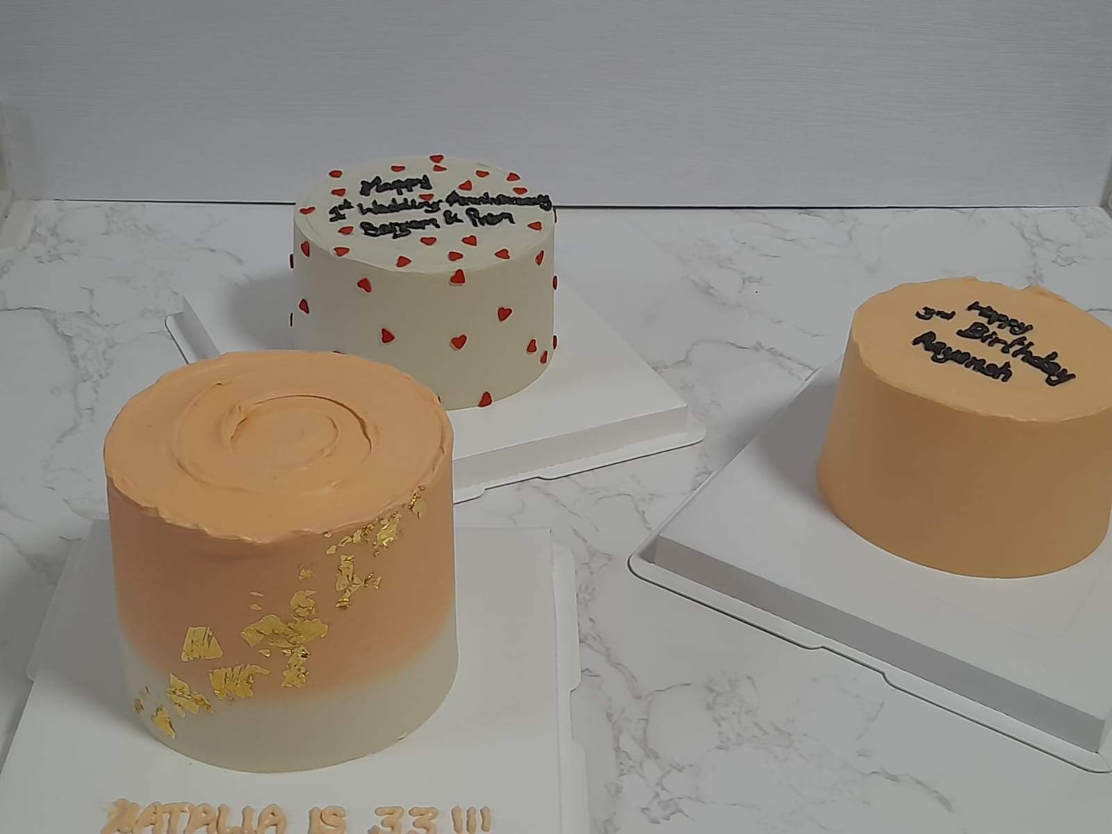 Three bento cakes for a birthday and an anniversary, by Bakelicious By Aisha.