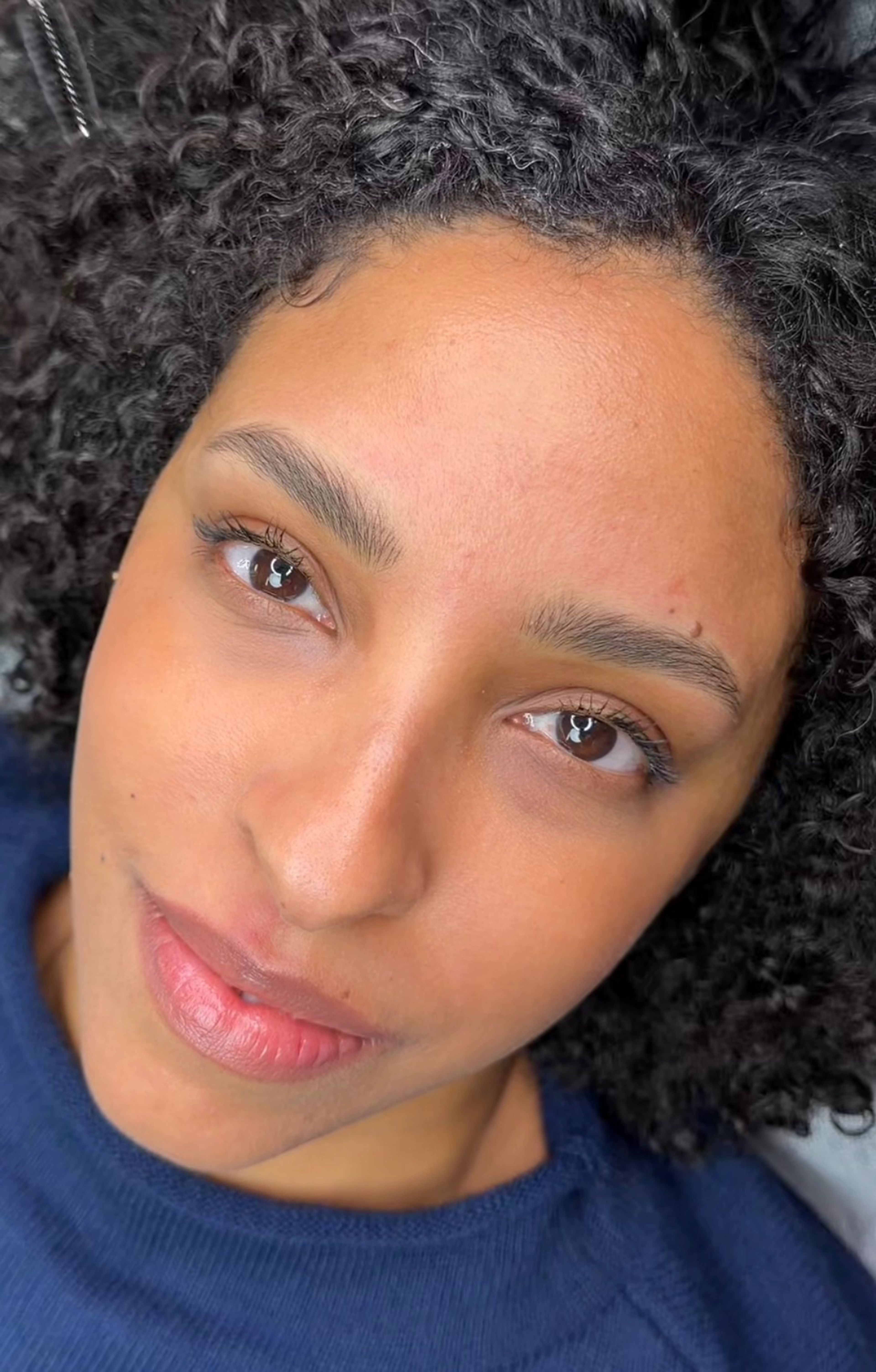 Nano brow hair strokes to demonstrate depth and realistic texture in permanent makeup.