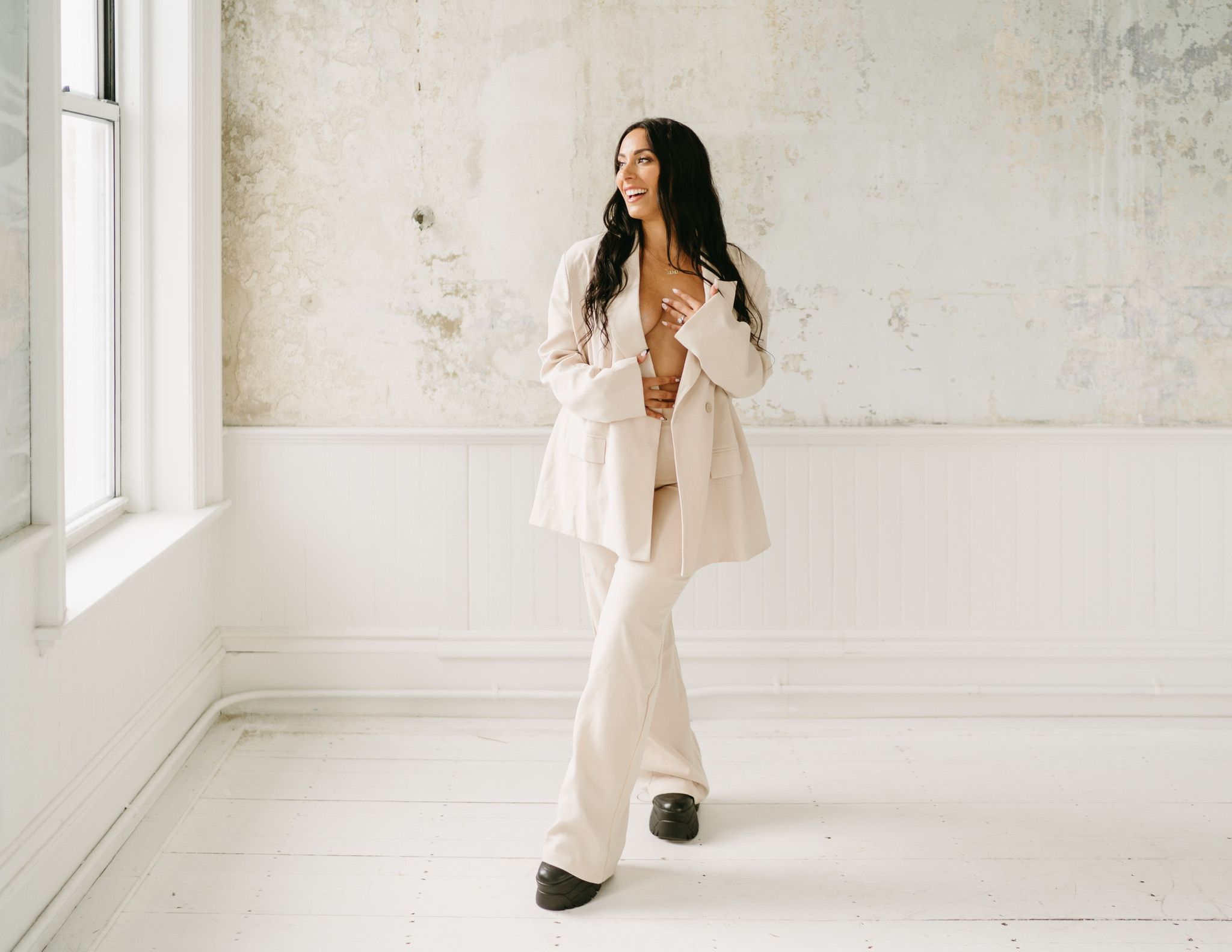 Alexa Nika posing at a professional photoshoot.