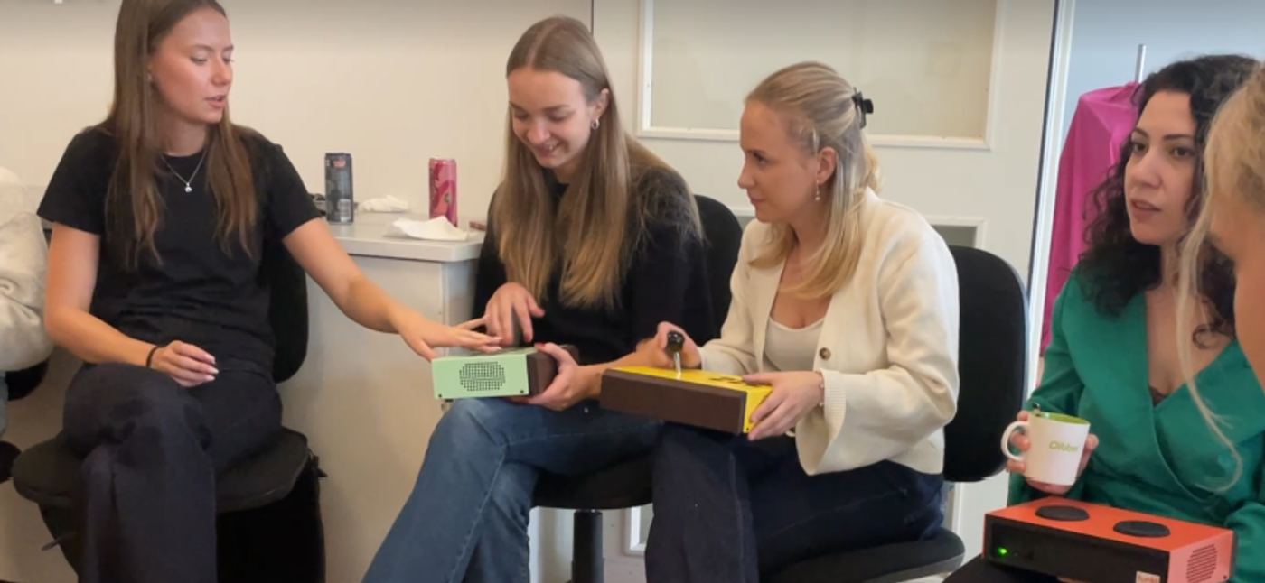 Four persons play on the Funki instruments