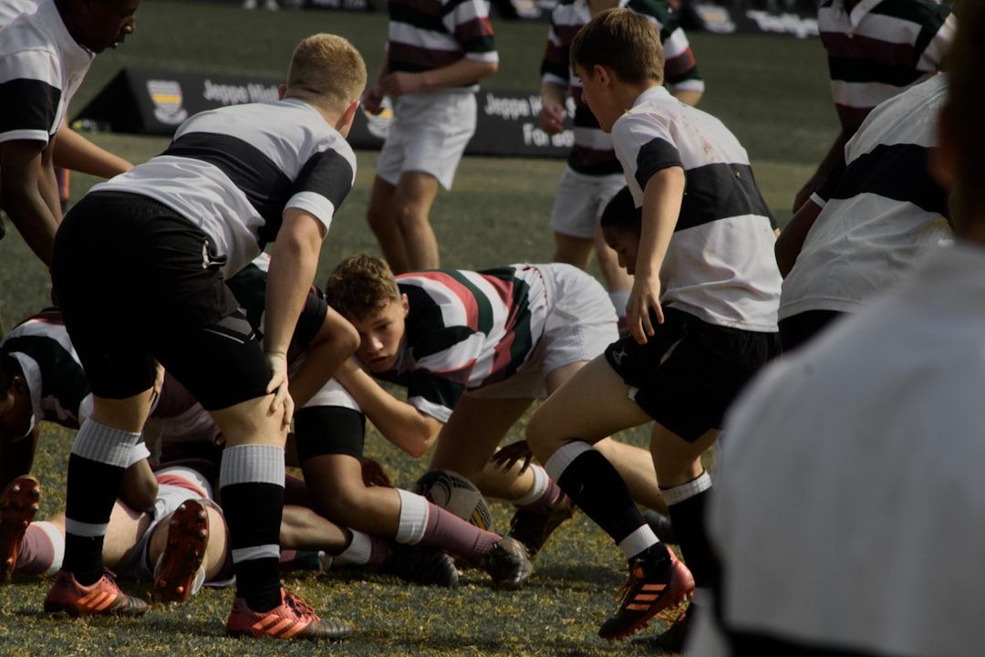 Rugby players competing in a scrum during an international match