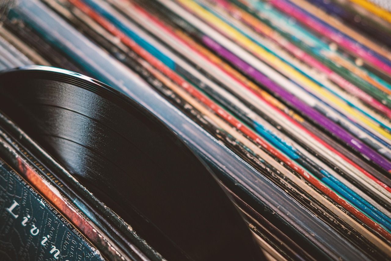 Vintage vinyl records evoking the retro musical roots of Bruno Mars