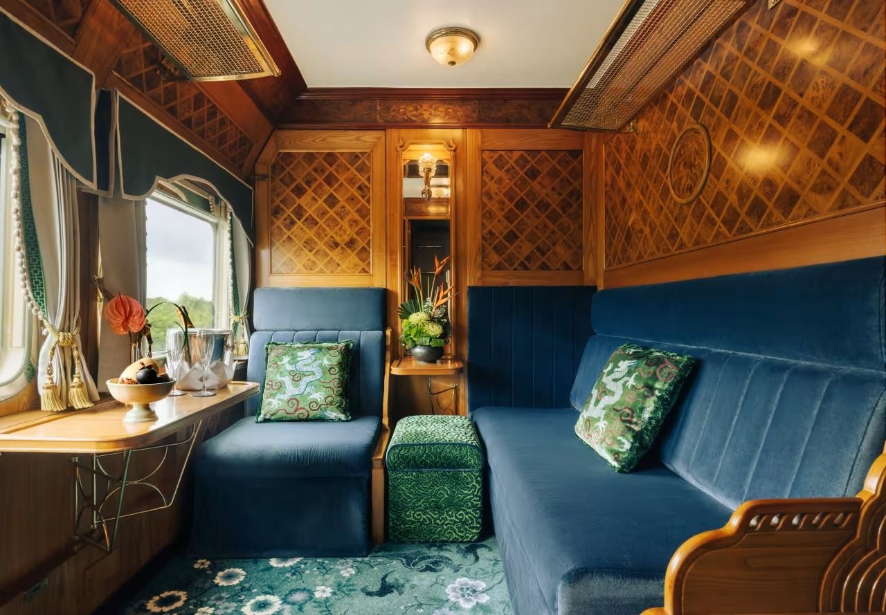 Interior of an Eastern & Oriental Express State Cabin with elegant wood panelling