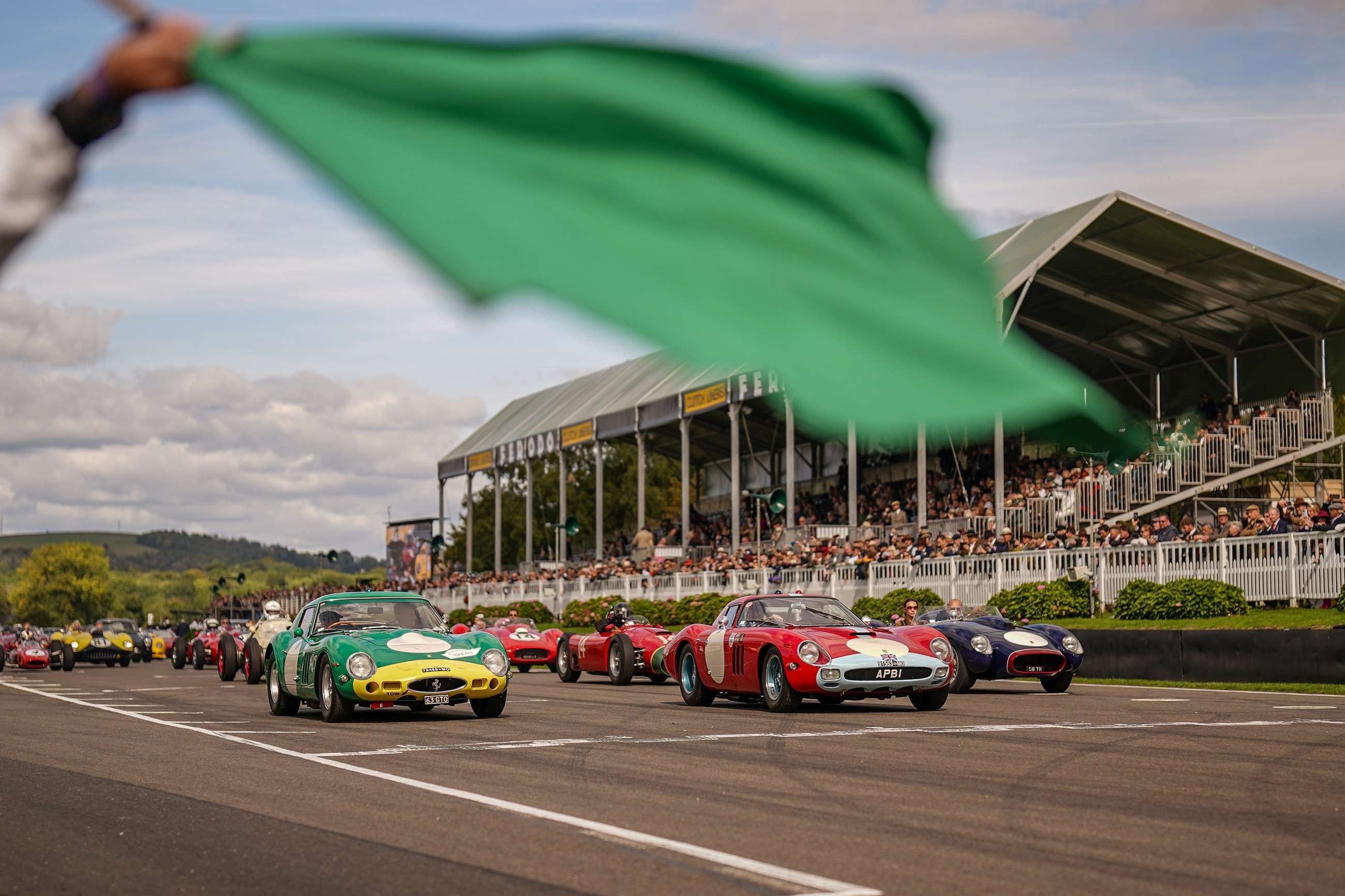 Classic saloon cars racing in the St Mary's Trophy at the Goodwood Revival