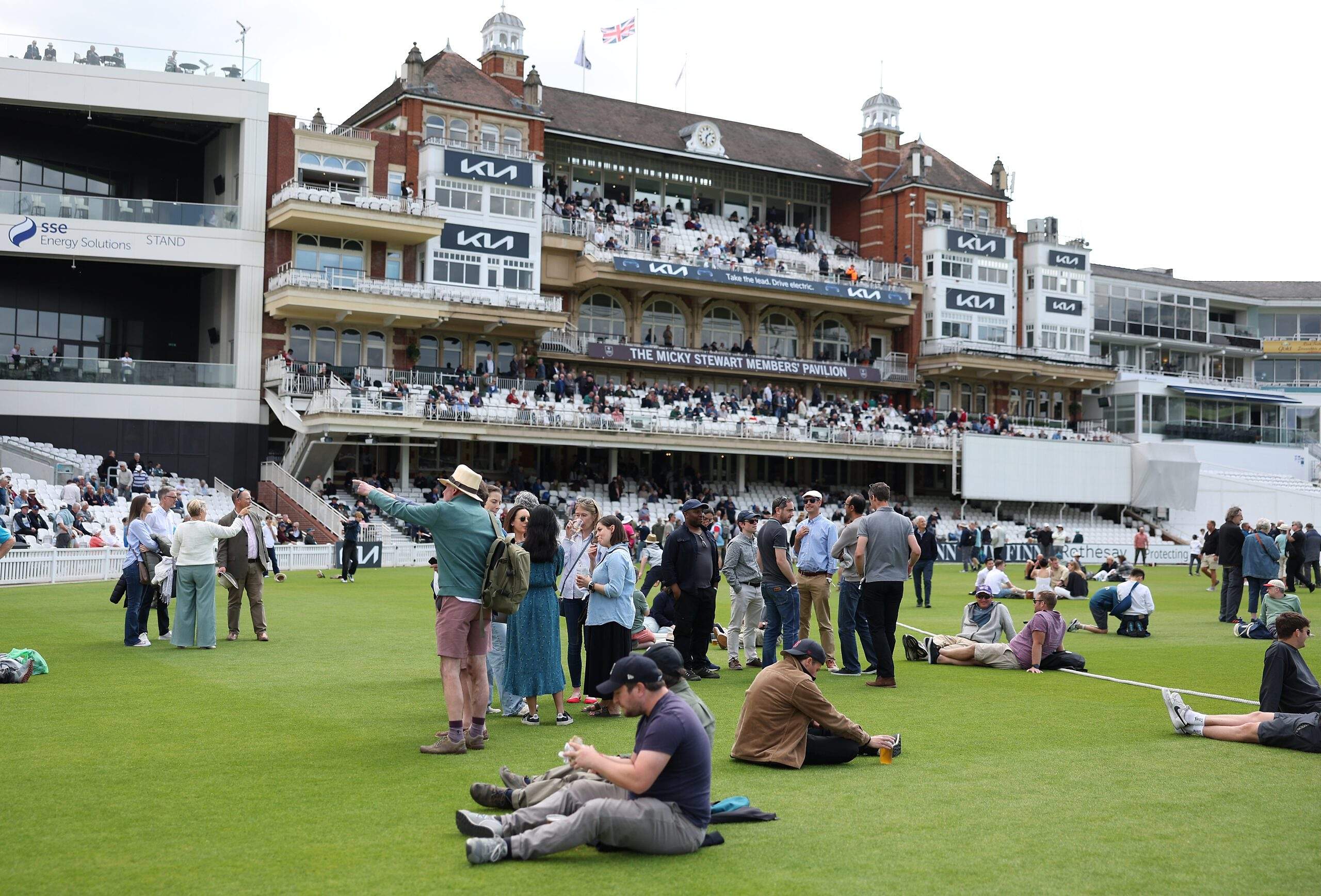 Kia Oval fans on pitch