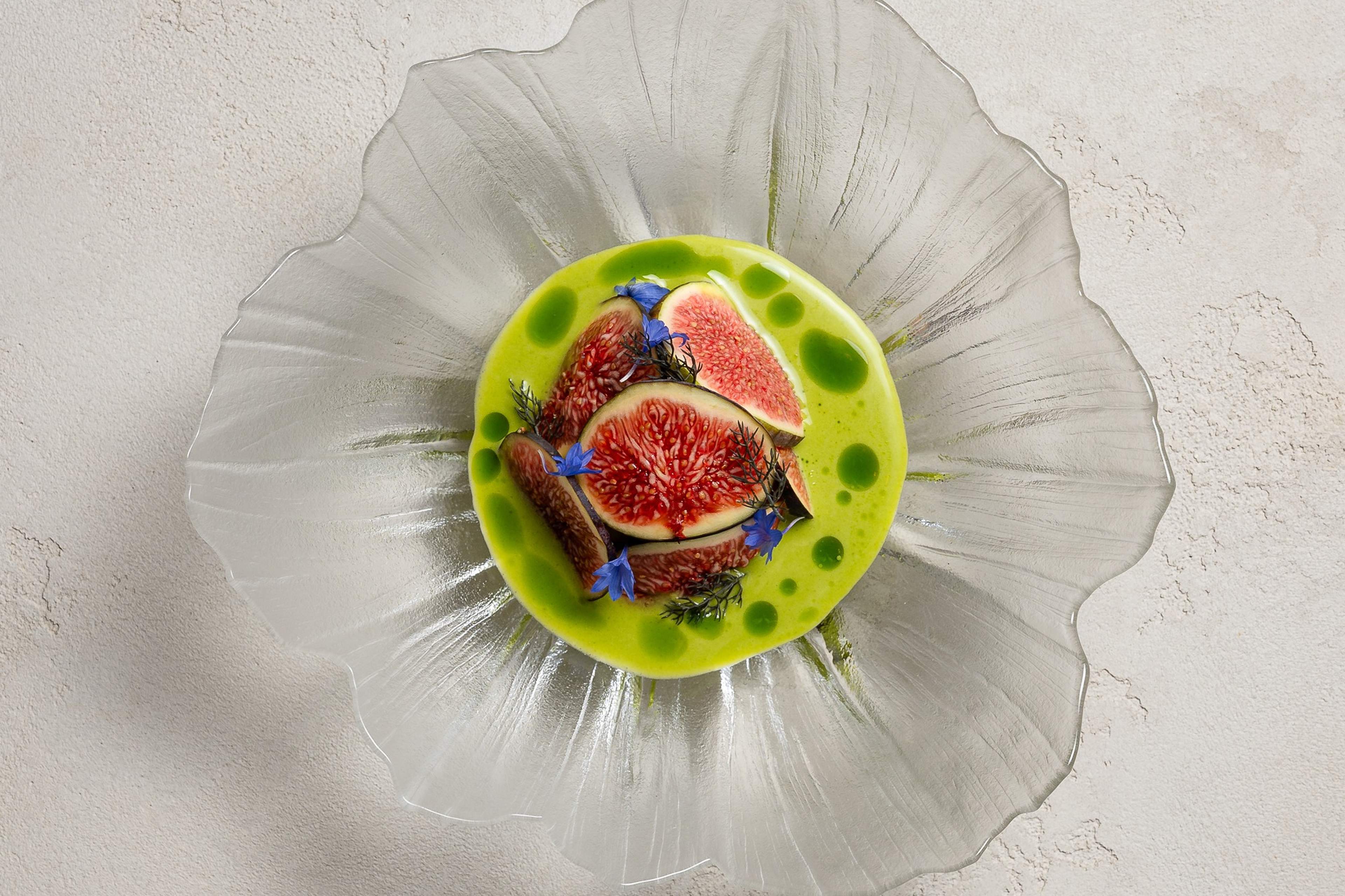Bluefin tuna tartare with fresh figs in a green apple and fig leaf sauce, in a glass bowl, at HIDE