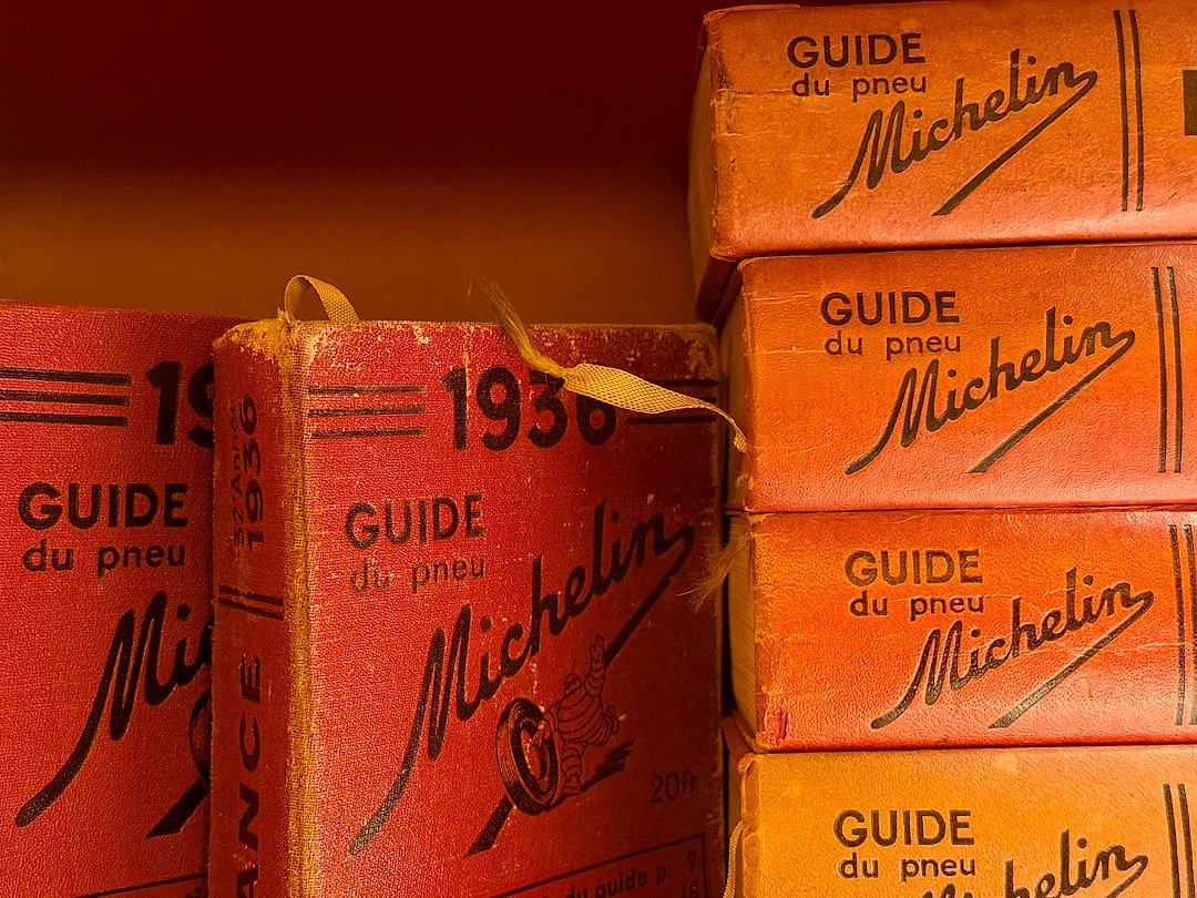 Stack of vintage Michelin Guide red books from the 1930s