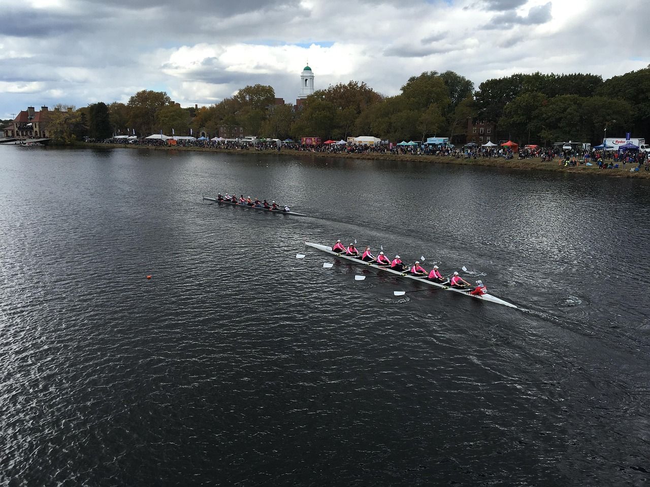 Rowing crews competing in a regatta, representing the enduring tradition of competitive racing at Henley