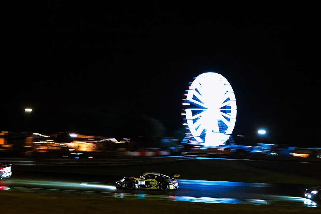 Ferris wheel lit up near the Las Vegas Grand Prix circuit at night