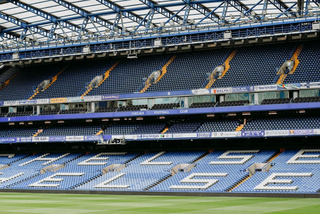 Stamford Bridge stadium interior with rows of blue seats