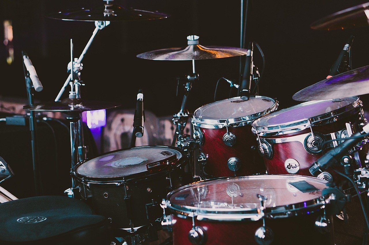 Drum kit on a concert stage, representing Queen's live performance setup