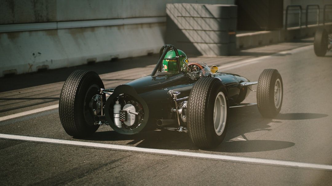 A vintage racing car at the Historic Grand Prix at Circuit Zandvoort, evoking the circuit's post-war origins