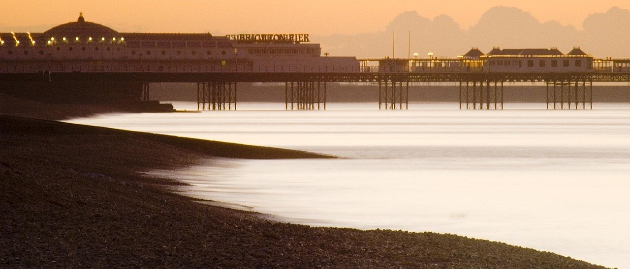 Brighton West Pier and seafront at sunset