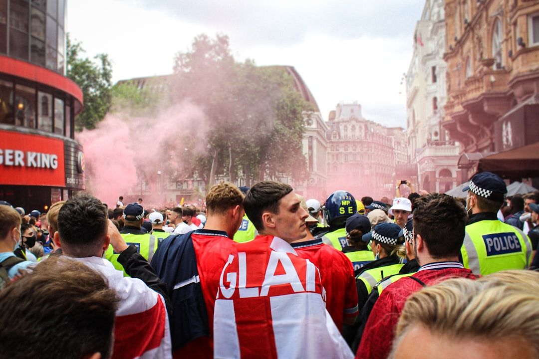 Premier League football fans creating atmosphere in the stands