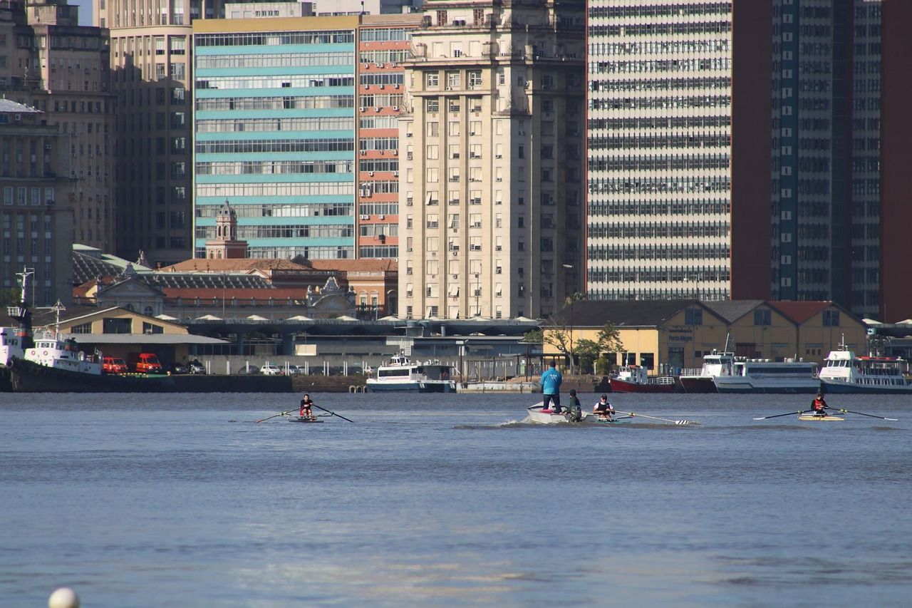 Colourful rowing boats at a regatta, reflecting the tradition of competitive racing