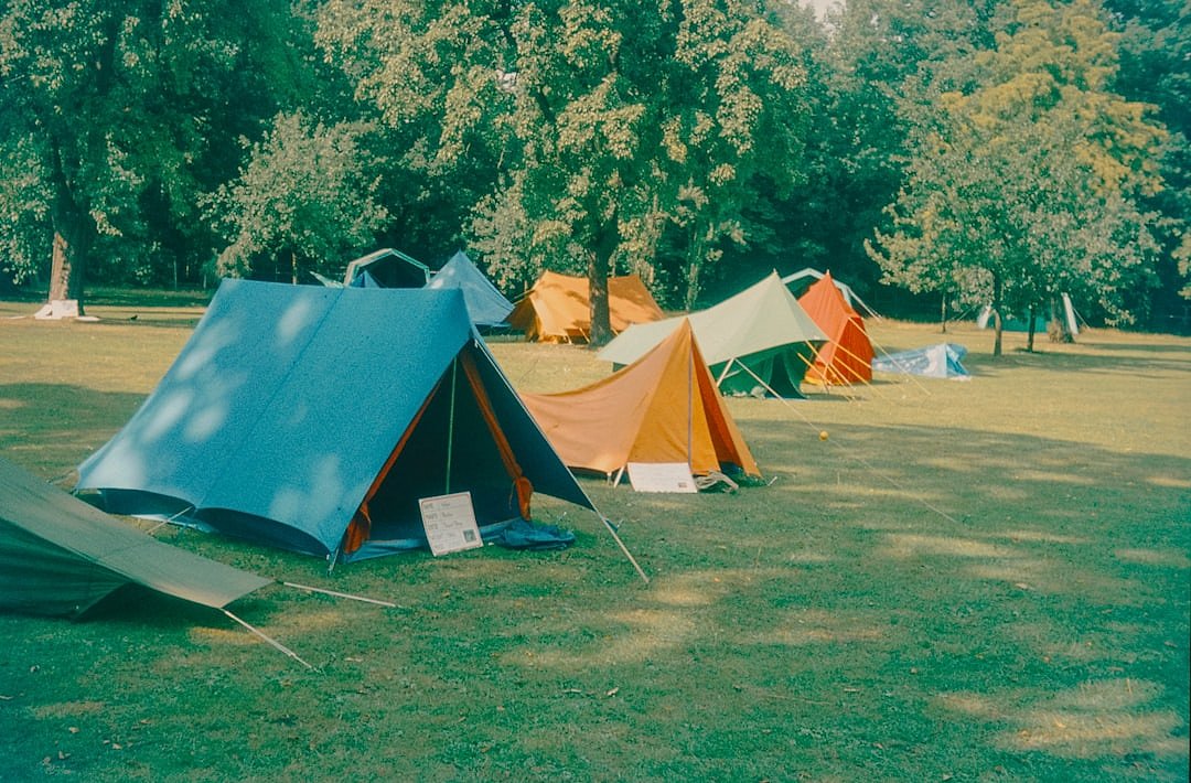 Colourful tents at a Glastonbury Festival campsite