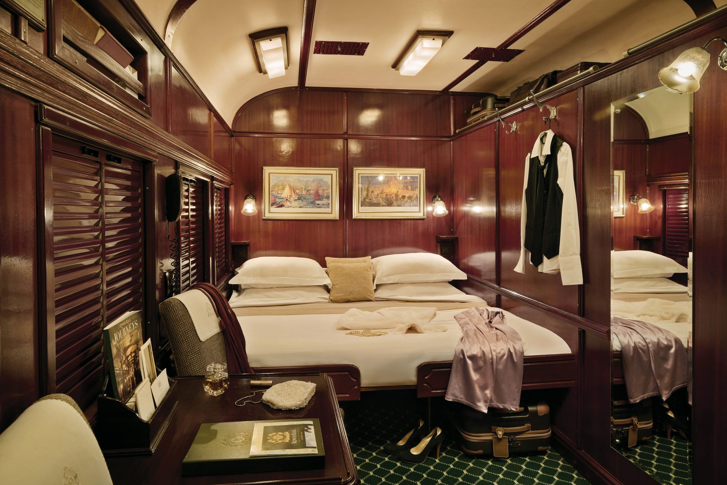 Rovos Rail Deluxe Suite interior with elegant period furnishings and large windows