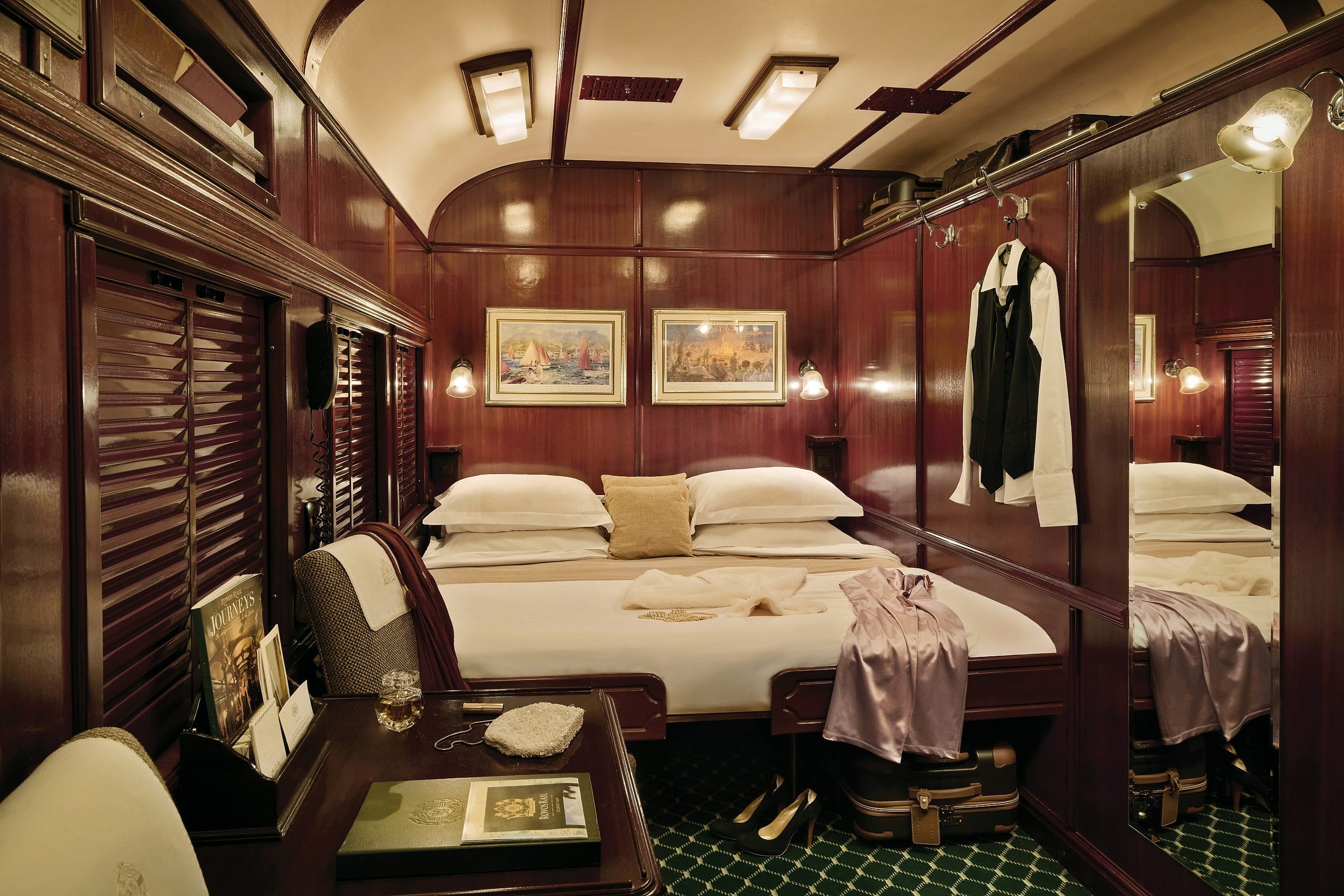 Rovos Rail Deluxe Suite interior with elegant period furnishings and large windows