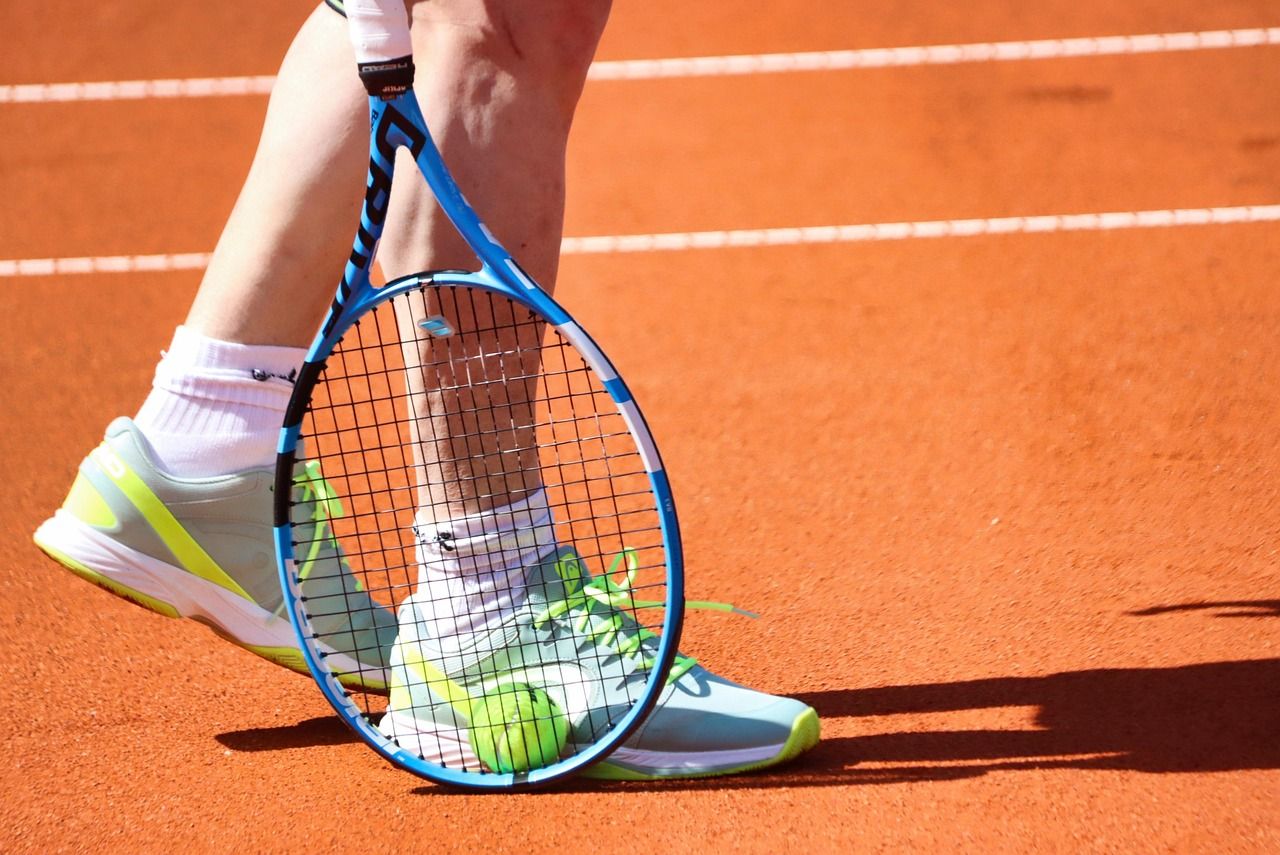 Tennis player in action on court, evoking the baseline rallies that define clay court tennis