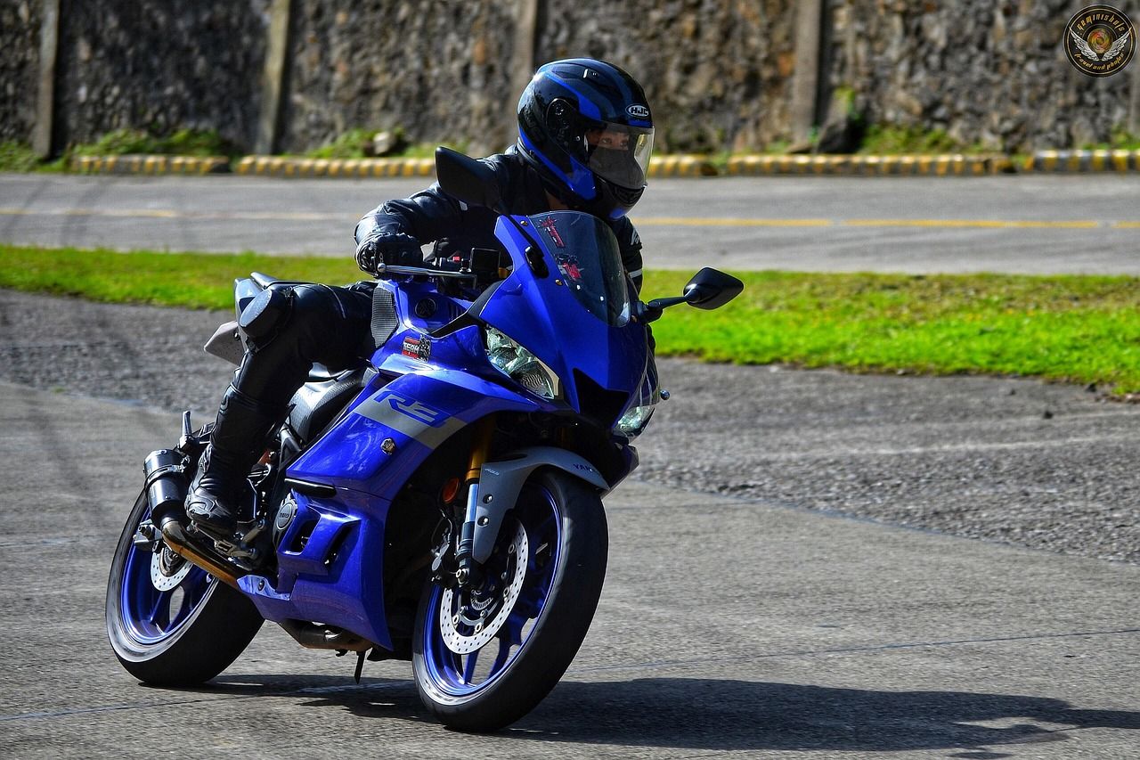 Professional motorcycle racer at speed on a racing circuit