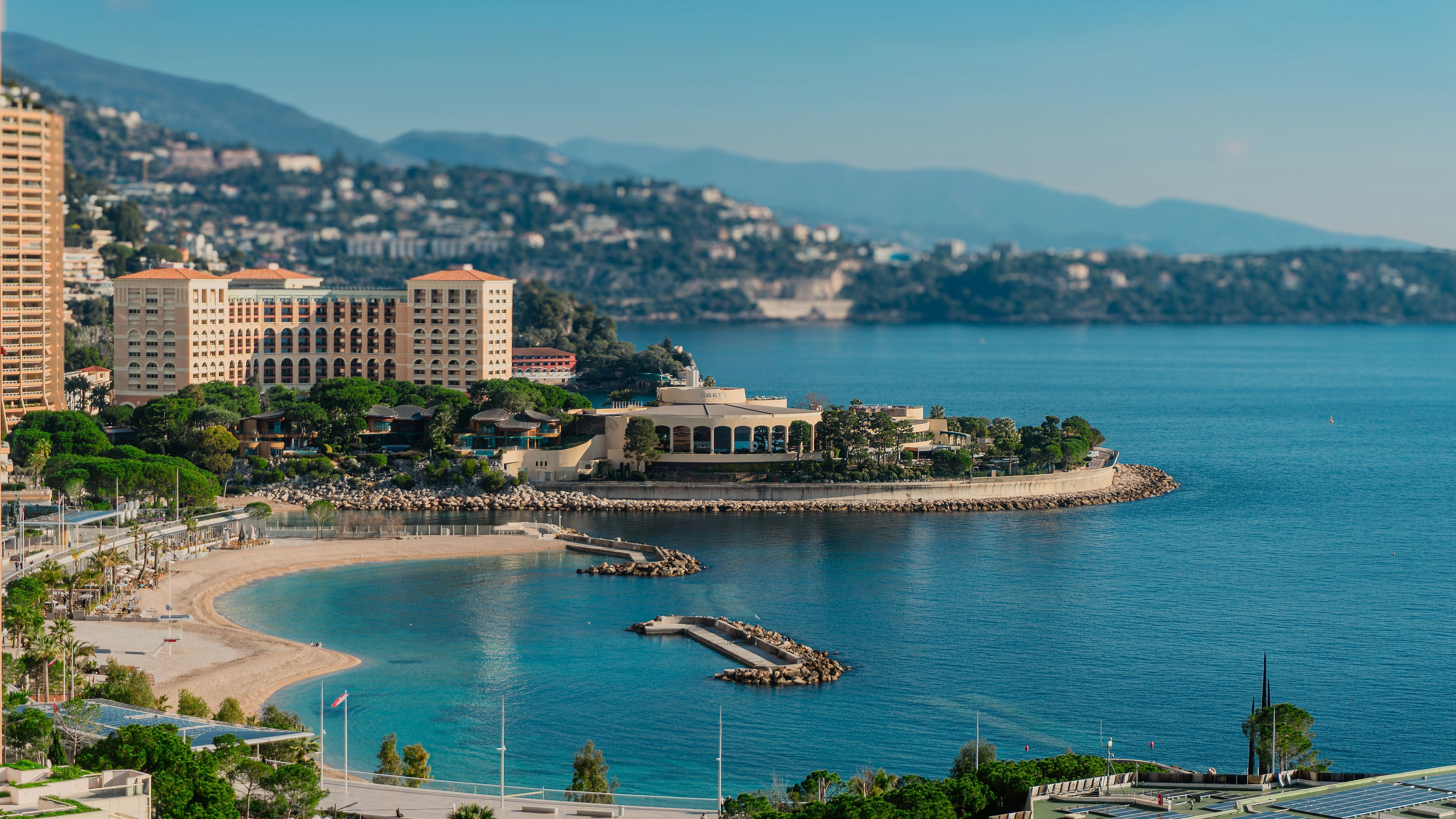 Larvotto Beach in Monaco with the bay and apartment blocks behind