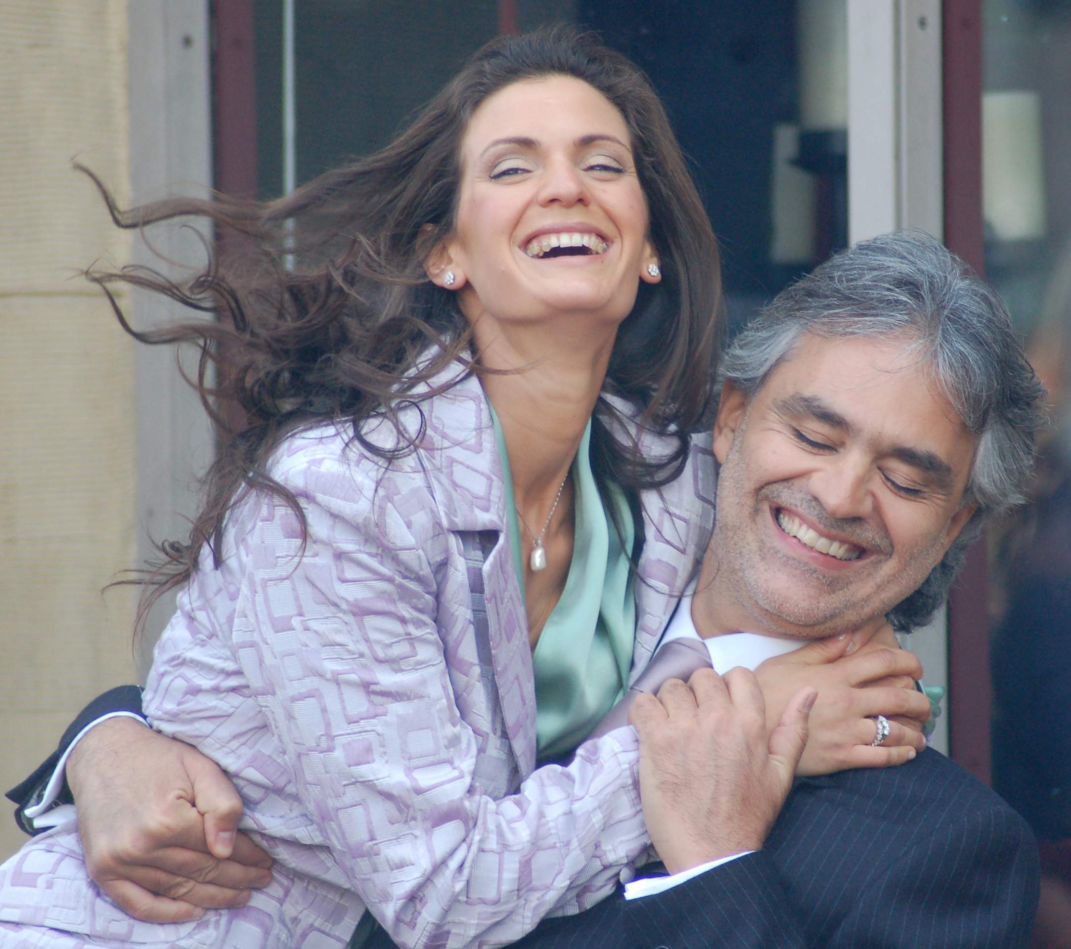 Andrea Bocelli laughing with Veronica Berti at his Walk of Fame ceremony