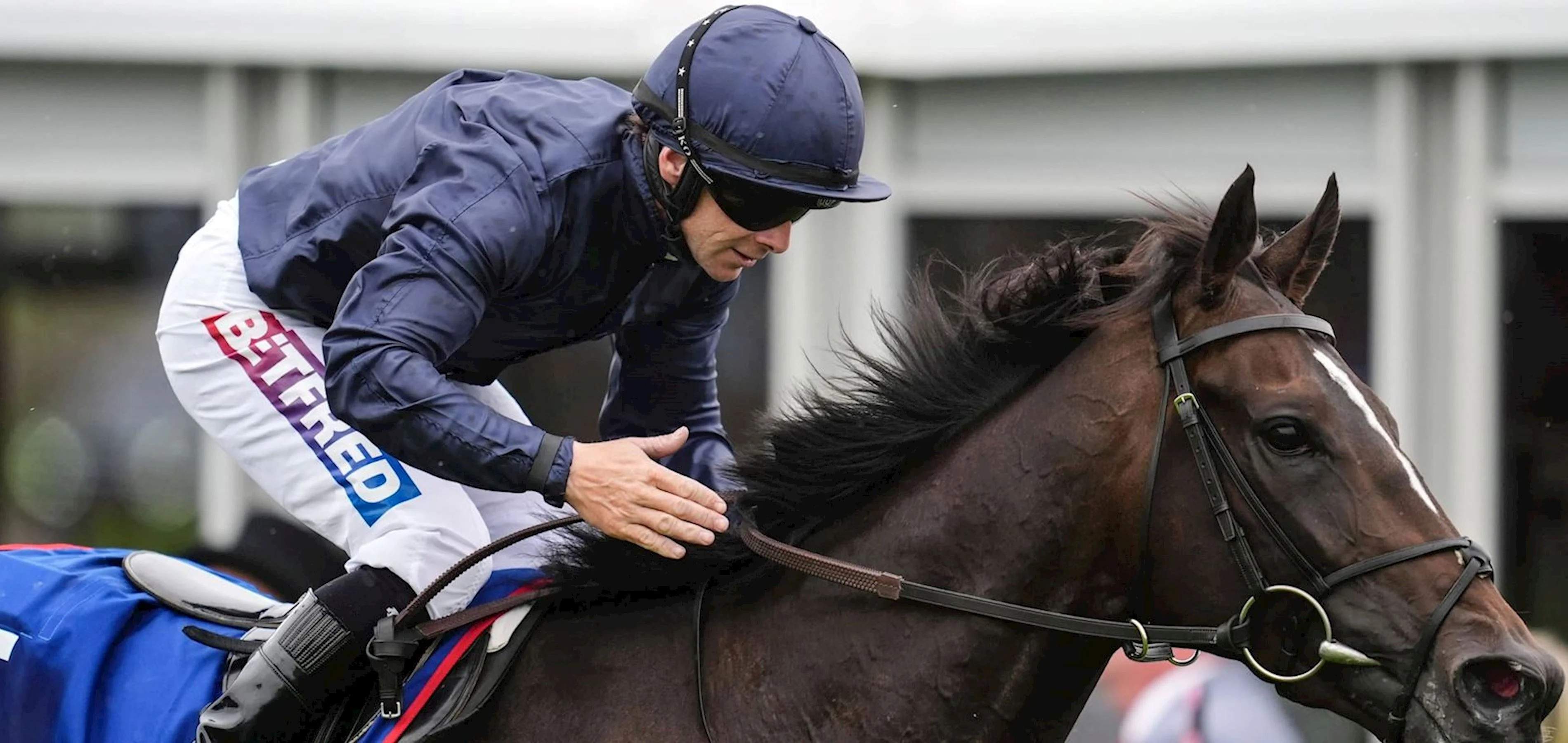 Epsom Downs Jockey racing on horse