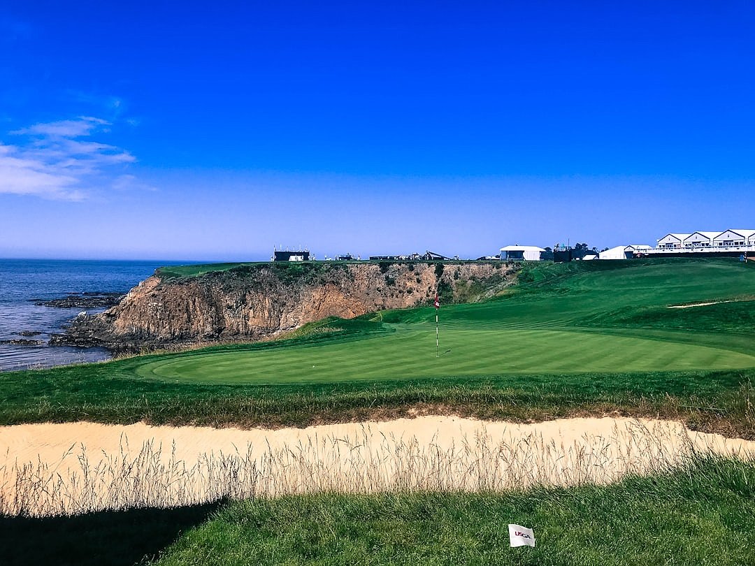 Dramatic clifftop links golf course overlooking the ocean, evoking Royal Portrush