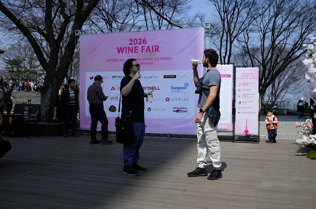 Visitors at an outdoor food and wine festival