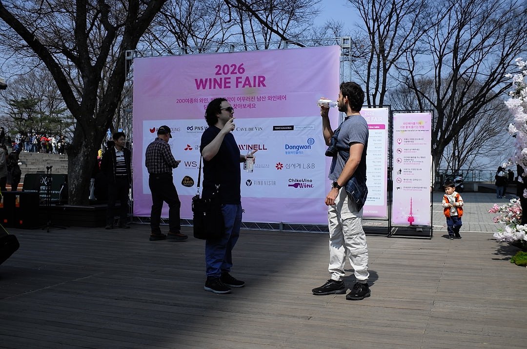 Visitors at an outdoor food and wine festival