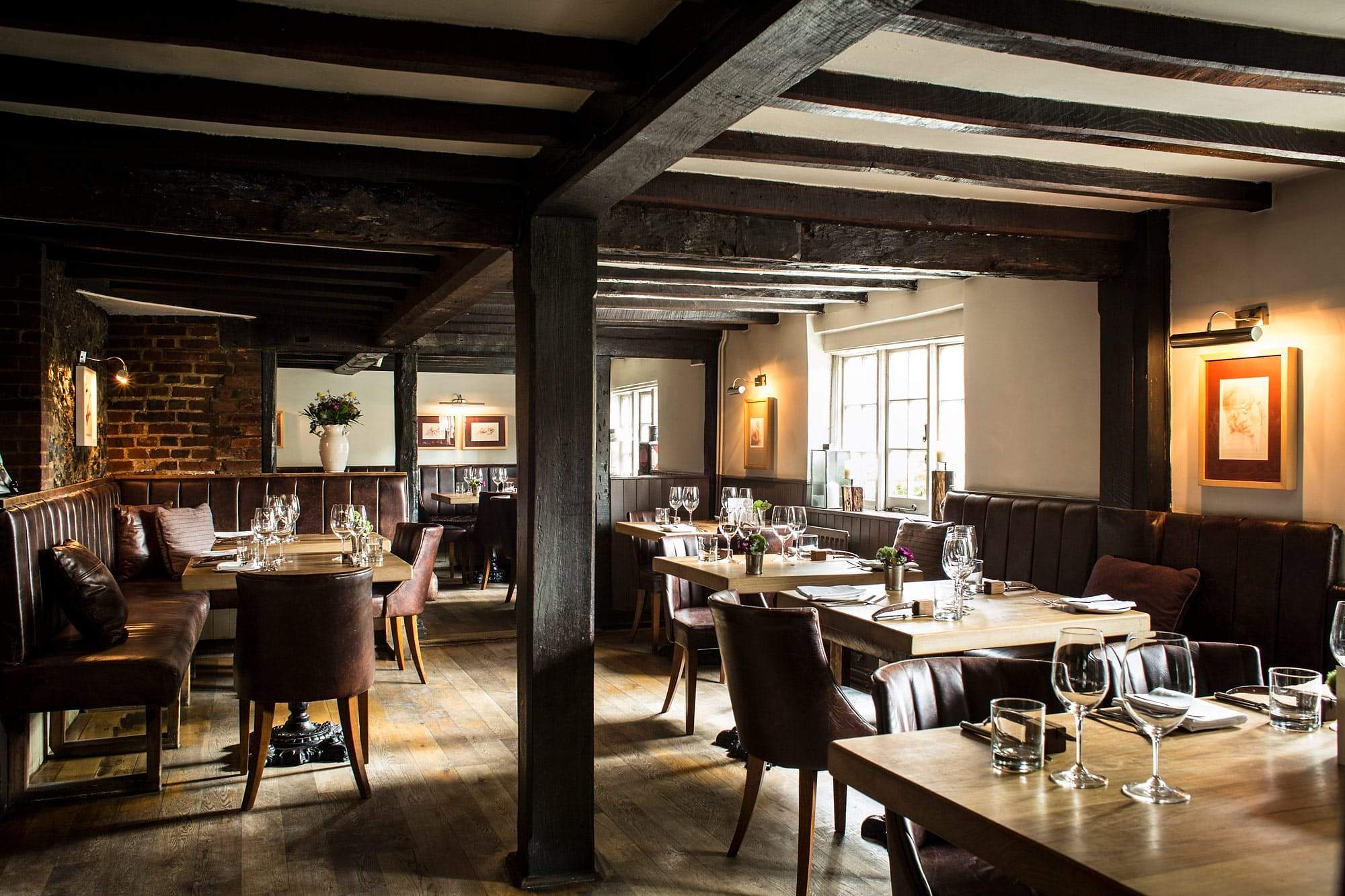 Oak-beamed dining room at The Hand and Flowers